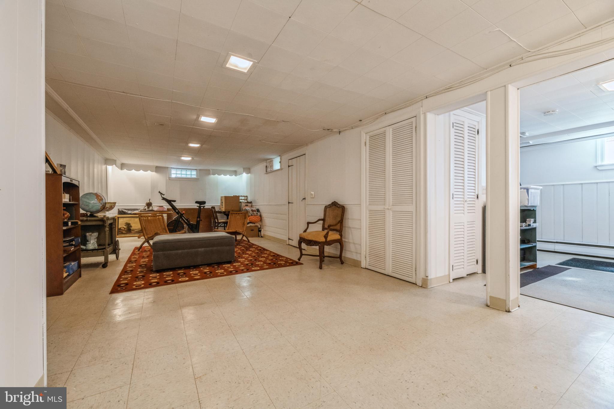 7 Perry Drive Ewing, NJ 08628 - Photo 31 of 39 a living room with furniture and a flat screen tv