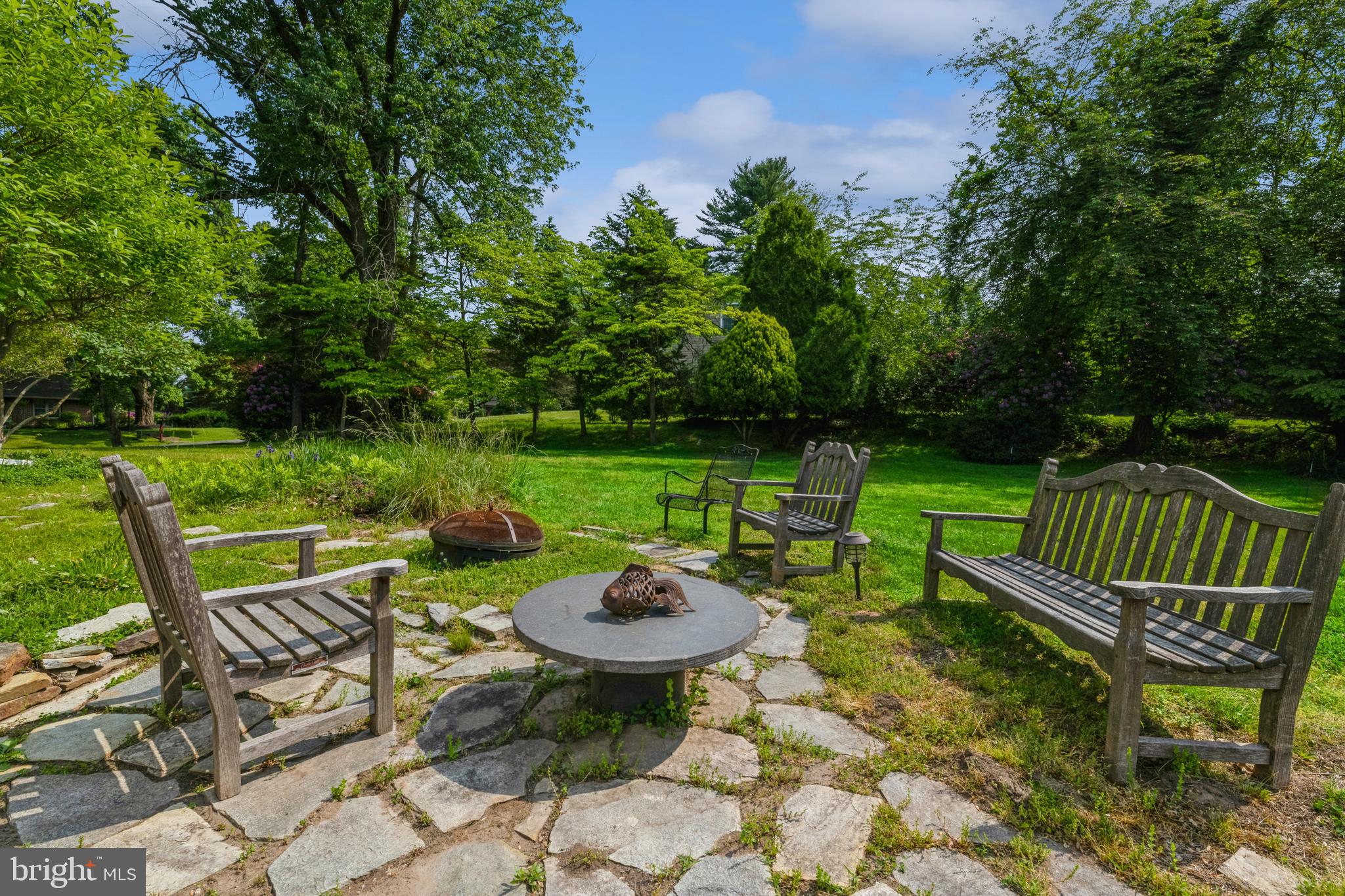 7 Perry Drive Ewing, NJ 08628 - Photo 35 of 39 a view of a chairs and table in the garden