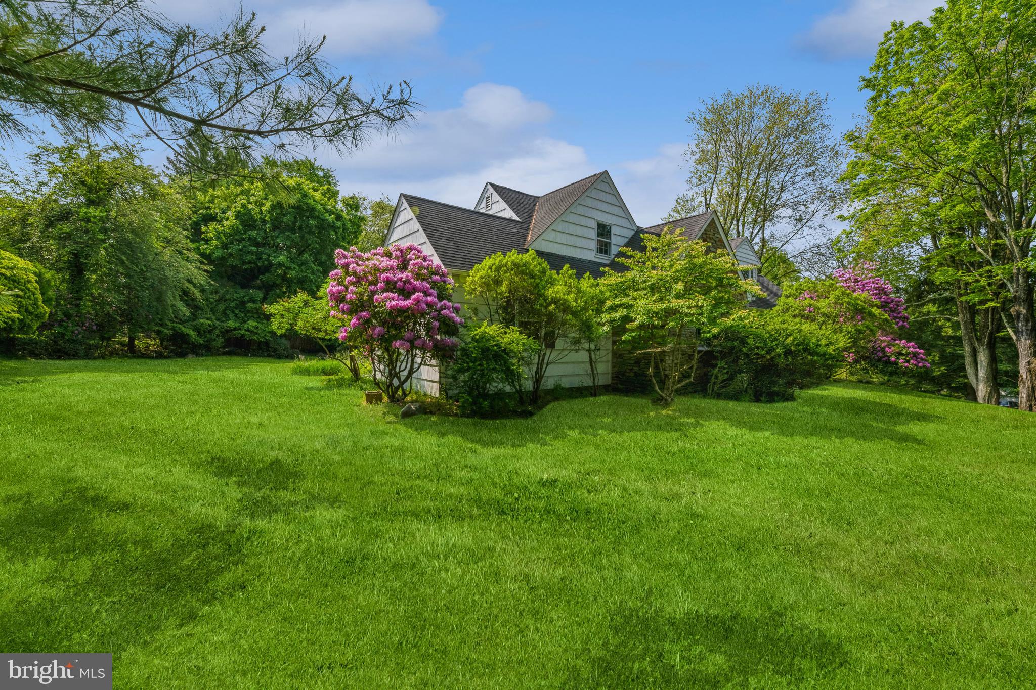7 Perry Drive Ewing, NJ 08628 - Photo 38 of 39 a front view of a house with a yard and fountain