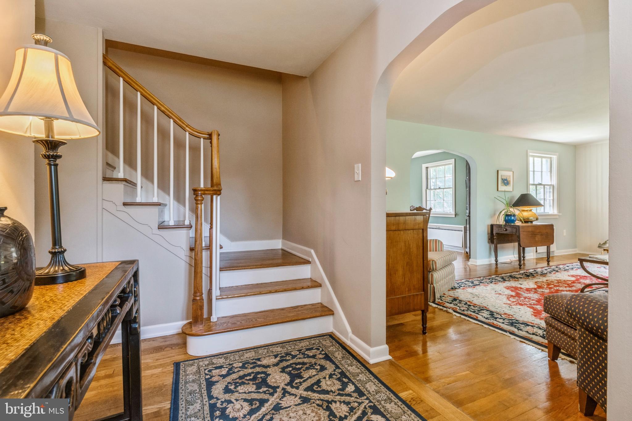 7 Perry Drive Ewing, NJ 08628 - Photo 4 of 39 a view of a hallway with furniture and staircase