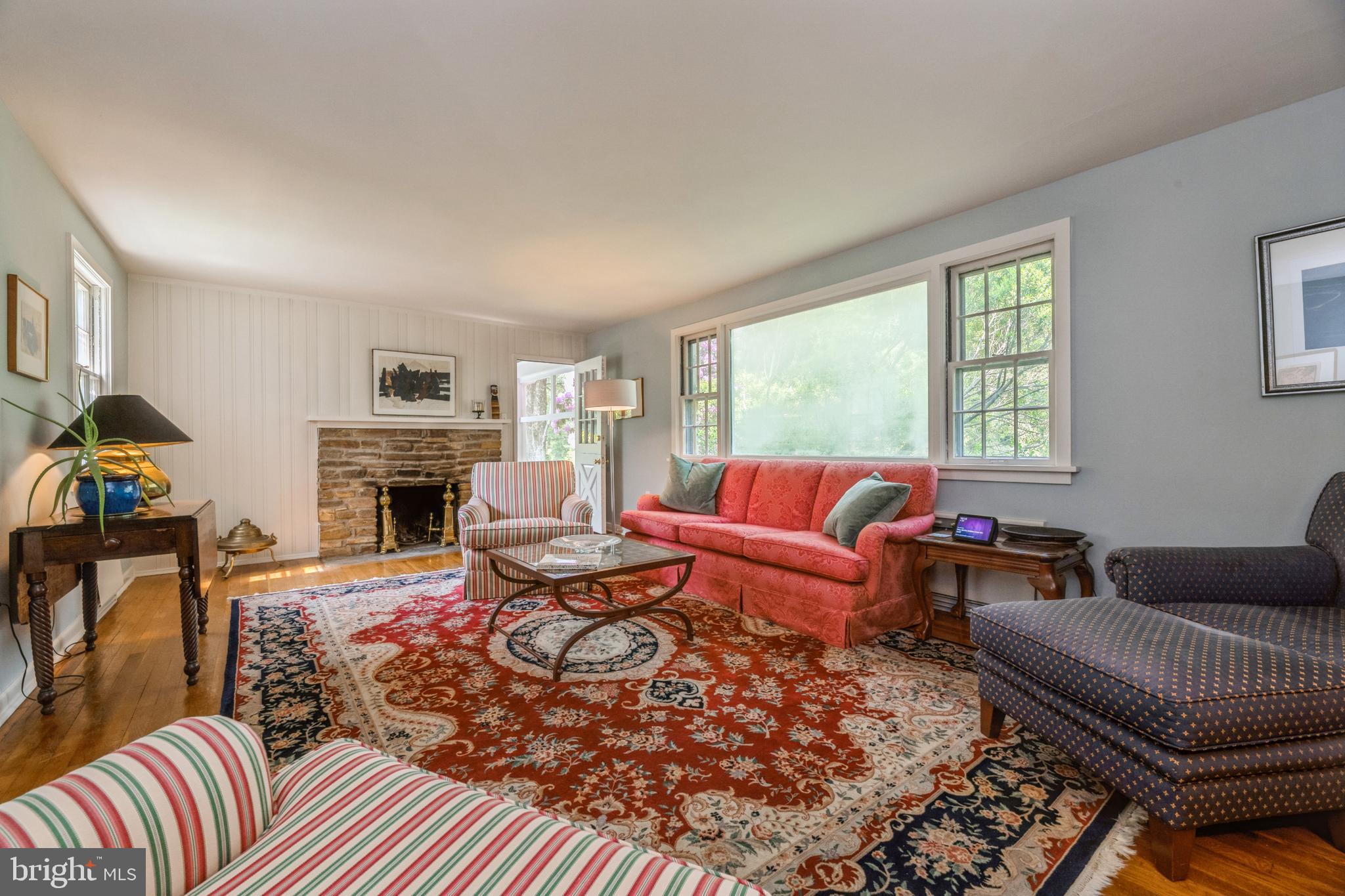 7 Perry Drive Ewing, NJ 08628 - Photo 5 of 39 a living room with furniture a fireplace and a window