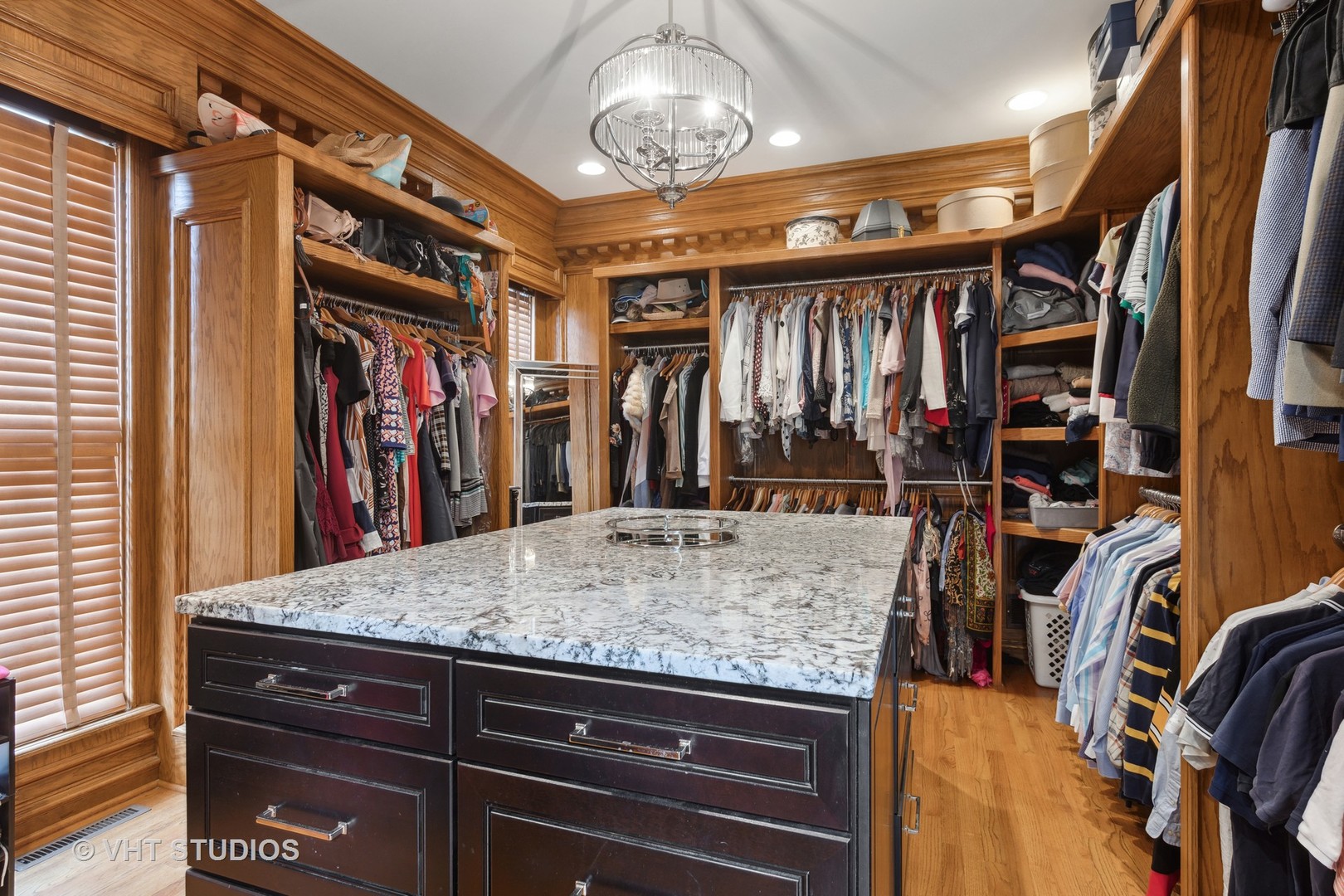 705 Fox Glen Drive St. Charles, IL 60174 - Photo 14 of 49 a view of a refrigerator with a dining table and chairs