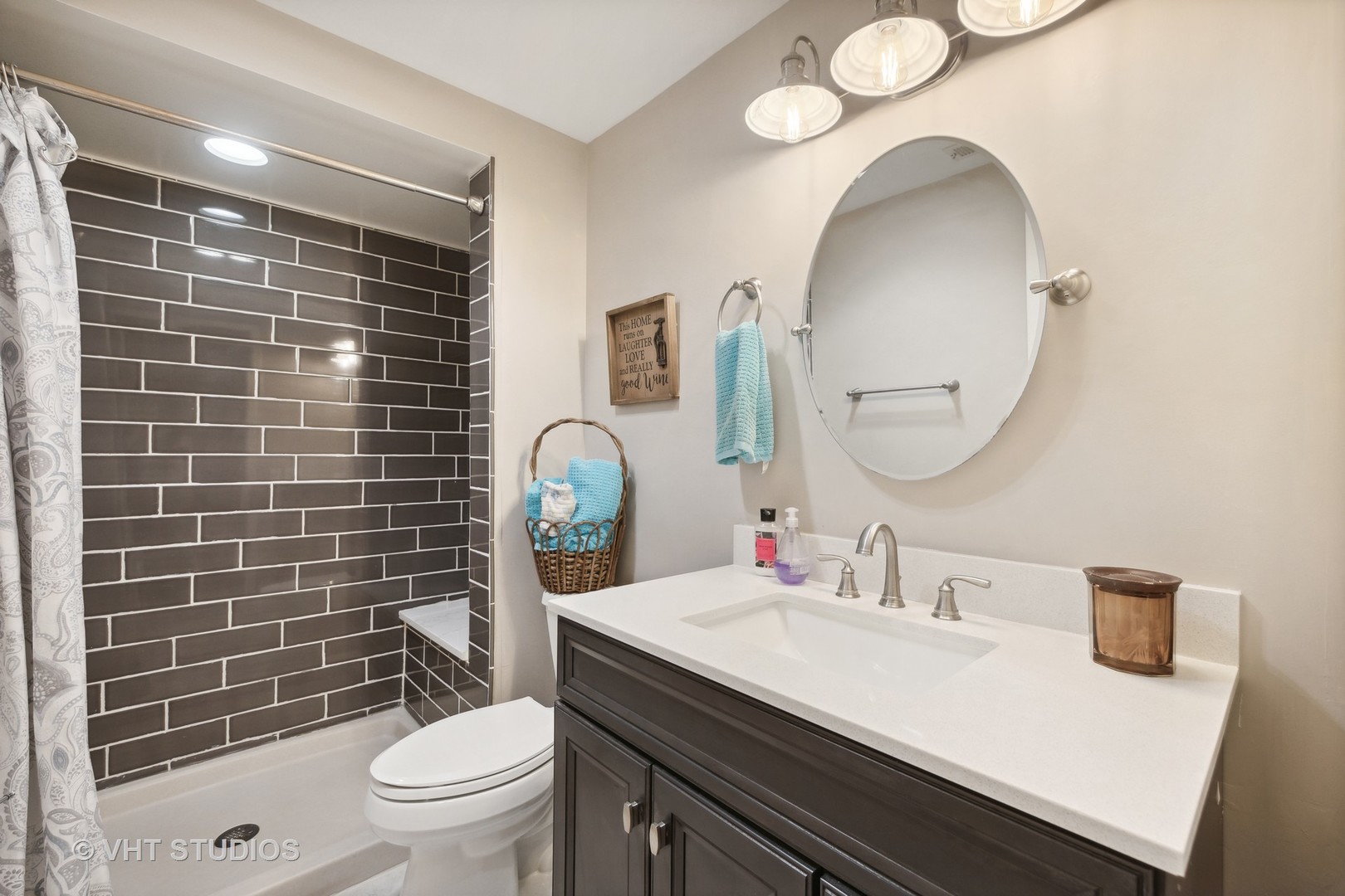 705 Fox Glen Drive St. Charles, IL 60174 - Photo 16 of 49 a bathroom with a sink a toilet and a mirror