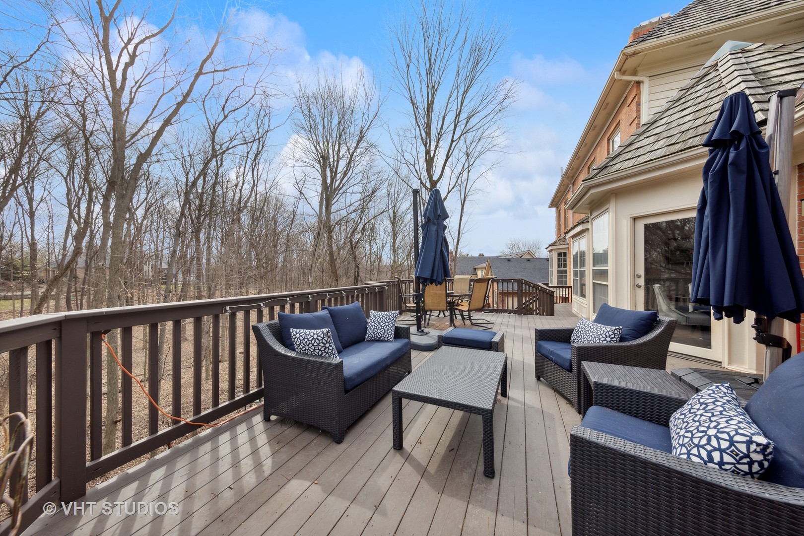 705 Fox Glen Drive St. Charles, IL 60174 - Photo 2 of 49 a view of a patio with couches and a potted plant on a table