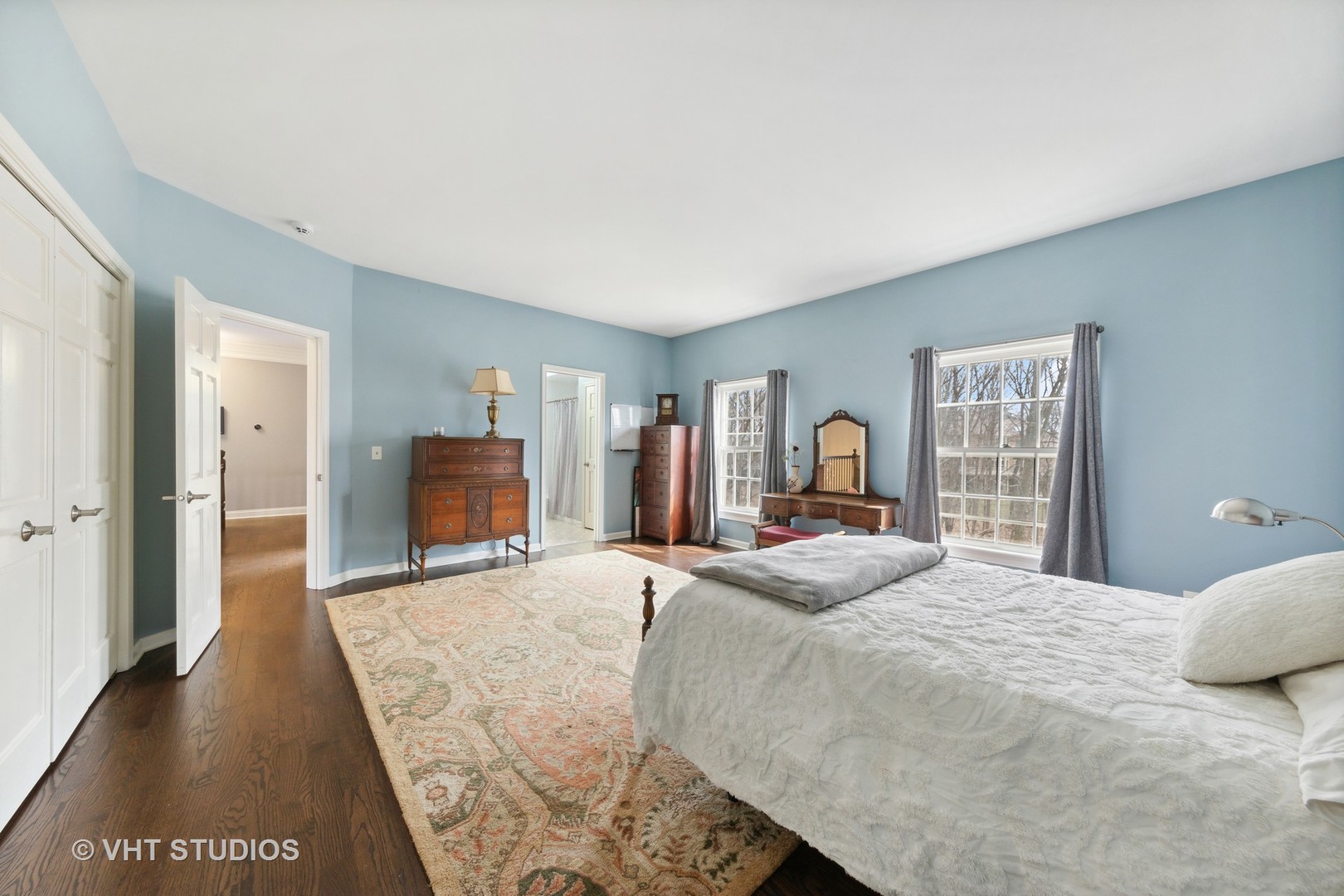 705 Fox Glen Drive St. Charles, IL 60174 - Photo 25 of 49 a bedroom with a large bed and a dresser