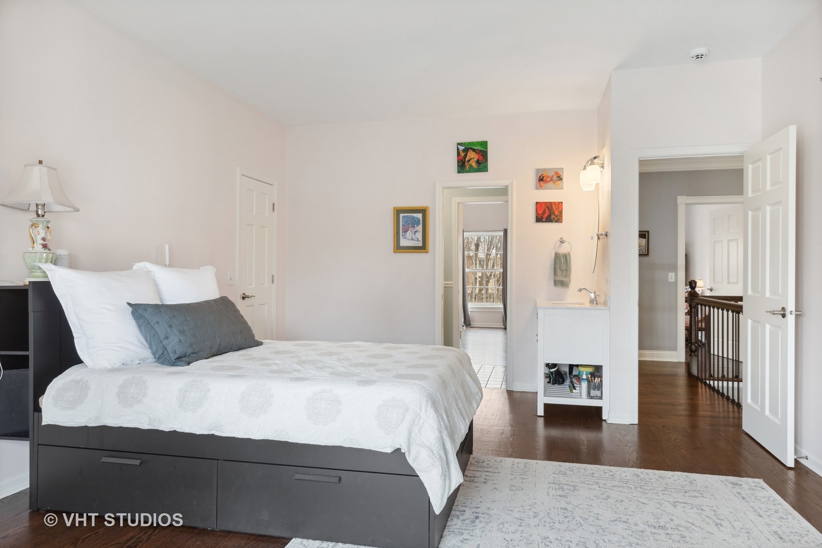 705 Fox Glen Drive St. Charles, IL 60174 - Photo 28 of 49 a bedroom with a bed and wooden floor