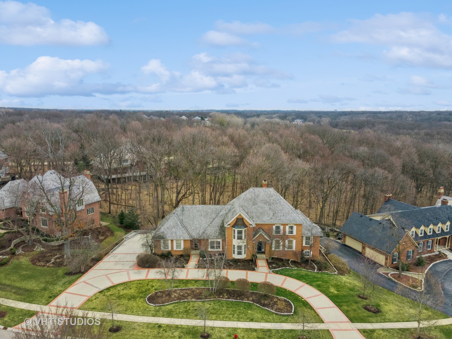 705 Fox Glen Drive St. Charles, IL 60174 - Photo 32 of 49 a front view of a house with garden