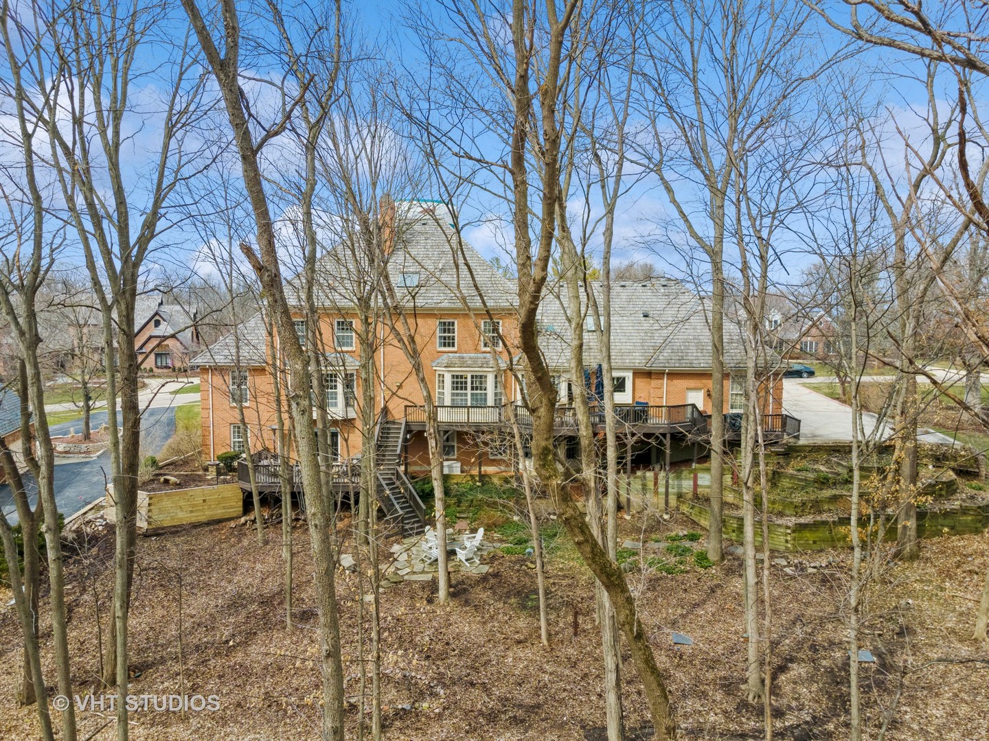 705 Fox Glen Drive St. Charles, IL 60174 - Photo 42 of 49 a backyard of a residential building with lots of green space