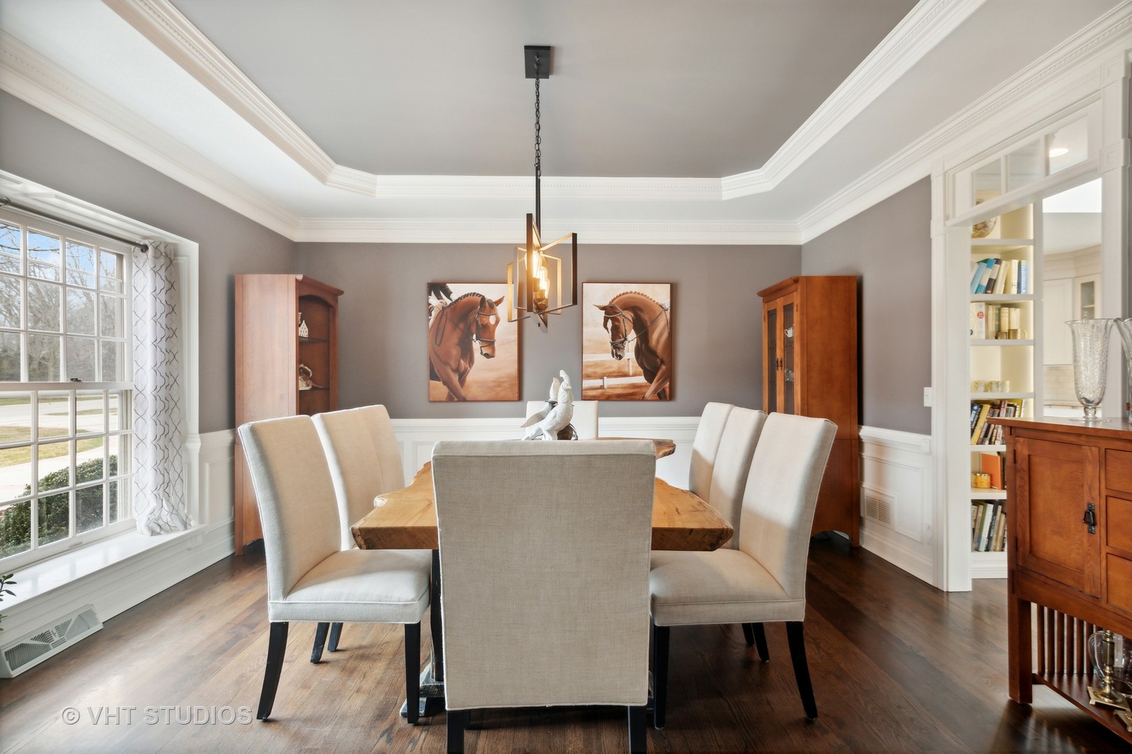 705 Fox Glen Drive St. Charles, IL 60174 - Photo 9 of 49 a view of a dining room with furniture window and wooden floor