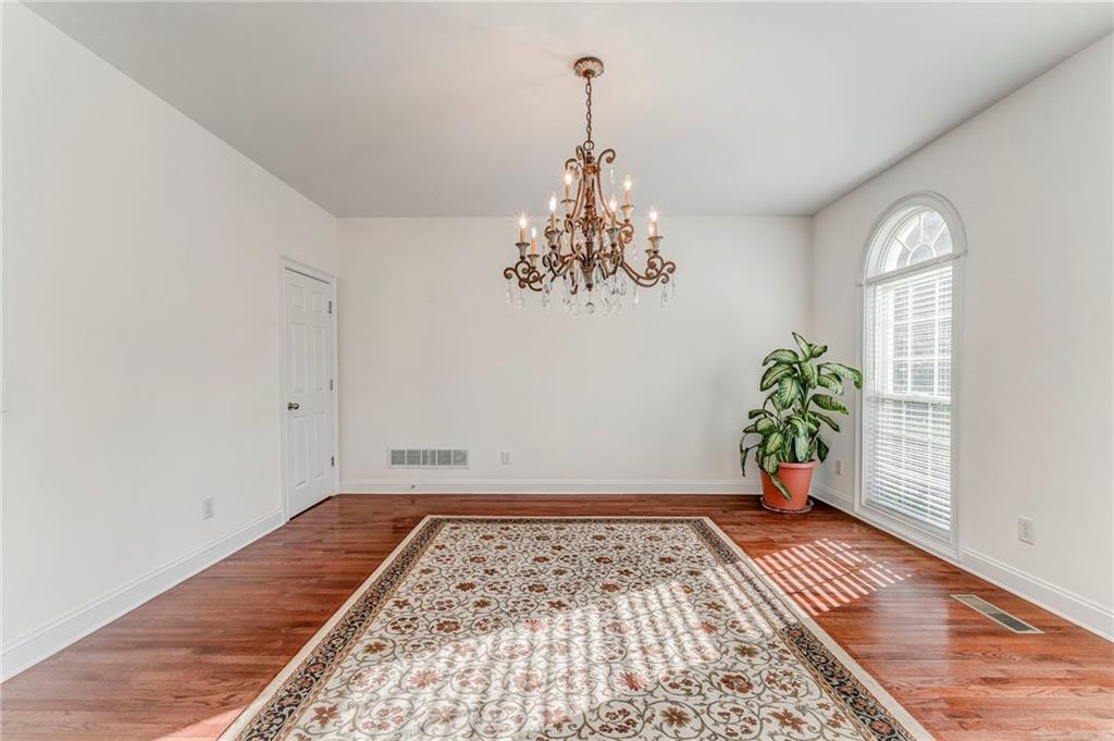5452 Old Dalton Road Northeast Calhoun, GA 30701 - Photo 12 of 50 a view of a room with window and wooden floor
