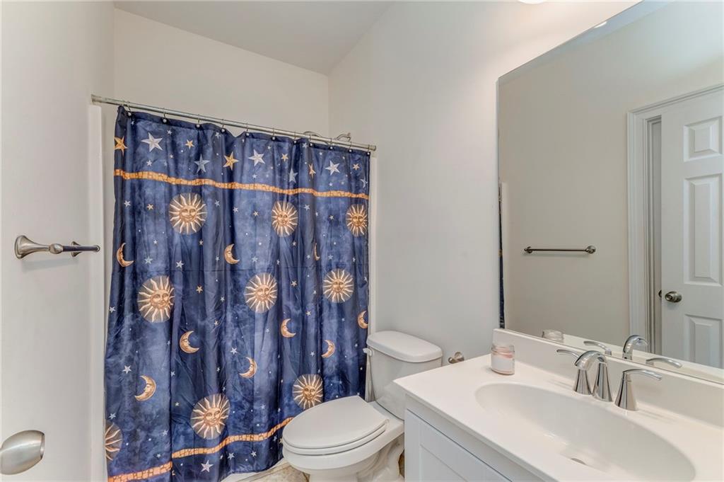 5452 Old Dalton Road Northeast Calhoun, GA 30701 - Photo 39 of 50 a bathroom with a sink toilet and shower