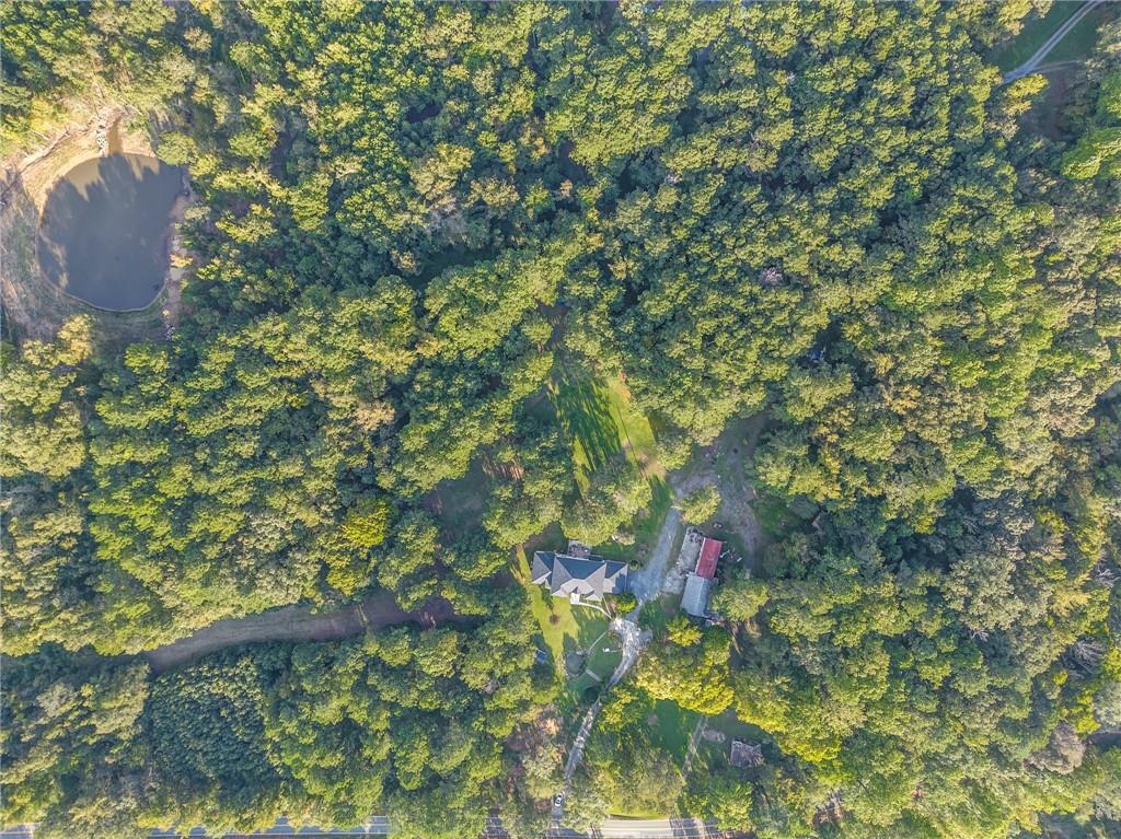 5452 Old Dalton Road Northeast Calhoun, GA 30701 - Photo 47 of 50 a backyard of a house with lots of green space