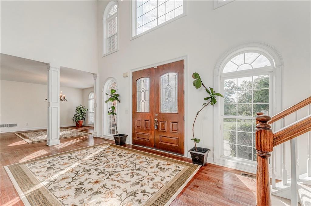5452 Old Dalton Road Northeast Calhoun, GA 30701 - Photo 5 of 50 workspace with wooden floor mirror and windows
