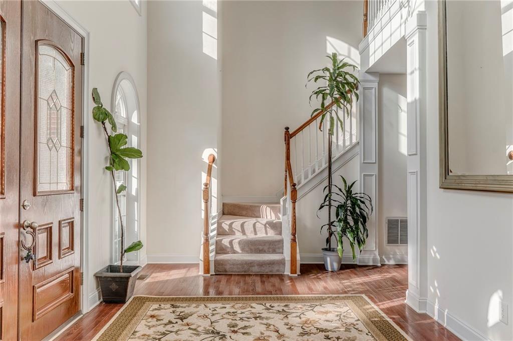 5452 Old Dalton Road Northeast Calhoun, GA 30701 - Photo 6 of 50 a living room filled with furniture and a potted plant