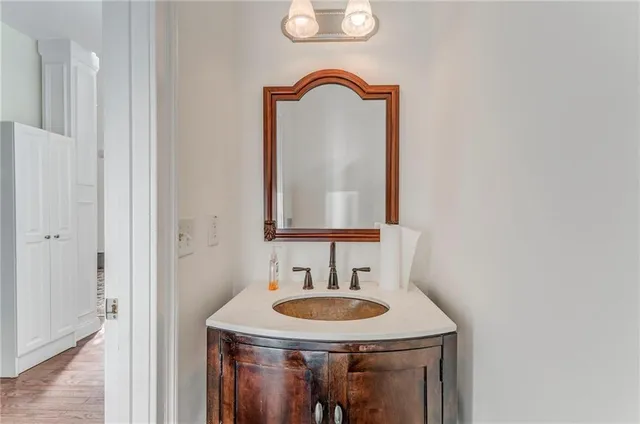 a bathroom with a sink and a mirror