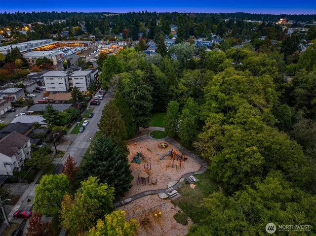 an aerial view of a house with lots of residential buildings