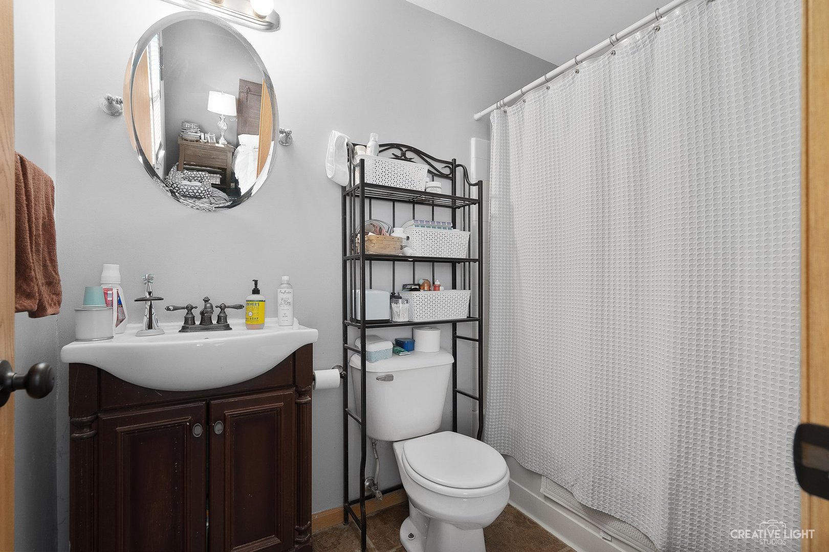 1805 Grandview Place Montgomery, IL 60538 - Photo 12 of 14 a bathroom with a sink a toilet and a mirror