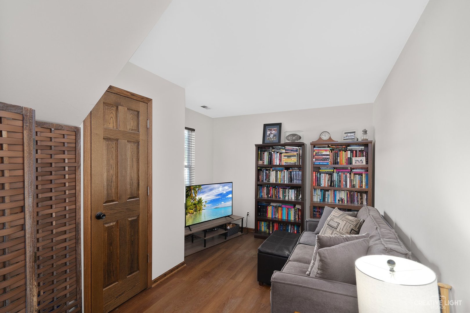 1805 Grandview Place Montgomery, IL 60538 - Photo 14 of 14 a living room with furniture and a flat screen tv