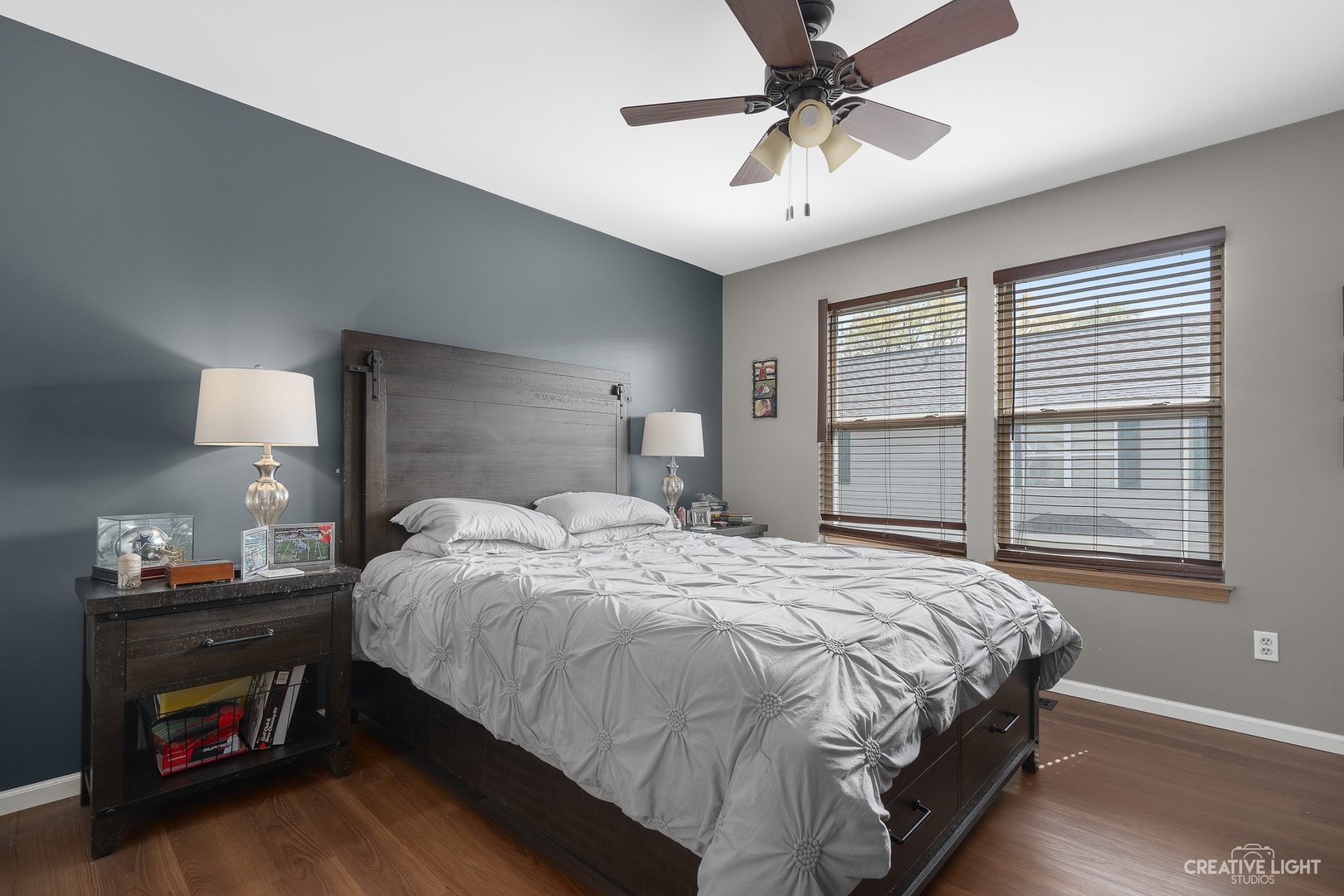 1805 Grandview Place Montgomery, IL 60538 - Photo 9 of 14 a bedroom with a bed and a chandelier