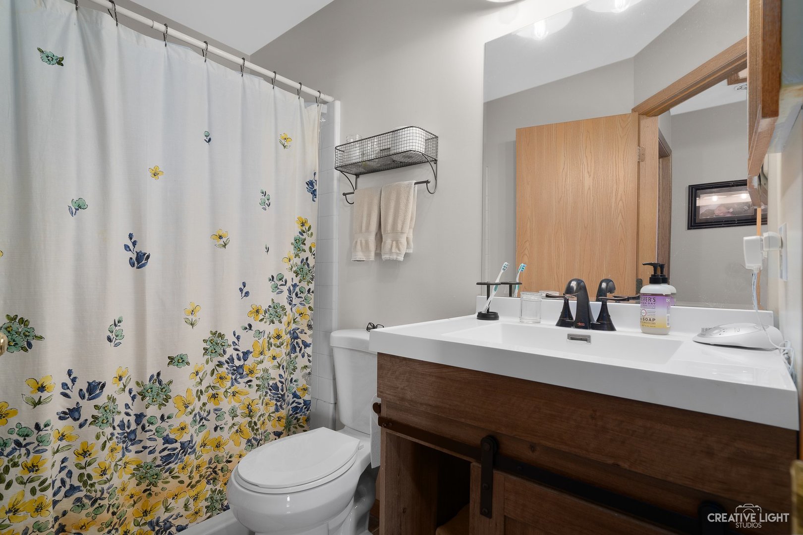 1805 Grandview Place Montgomery, IL 60538 - Photo 10 of 14 a bathroom with a sink toilet and shower