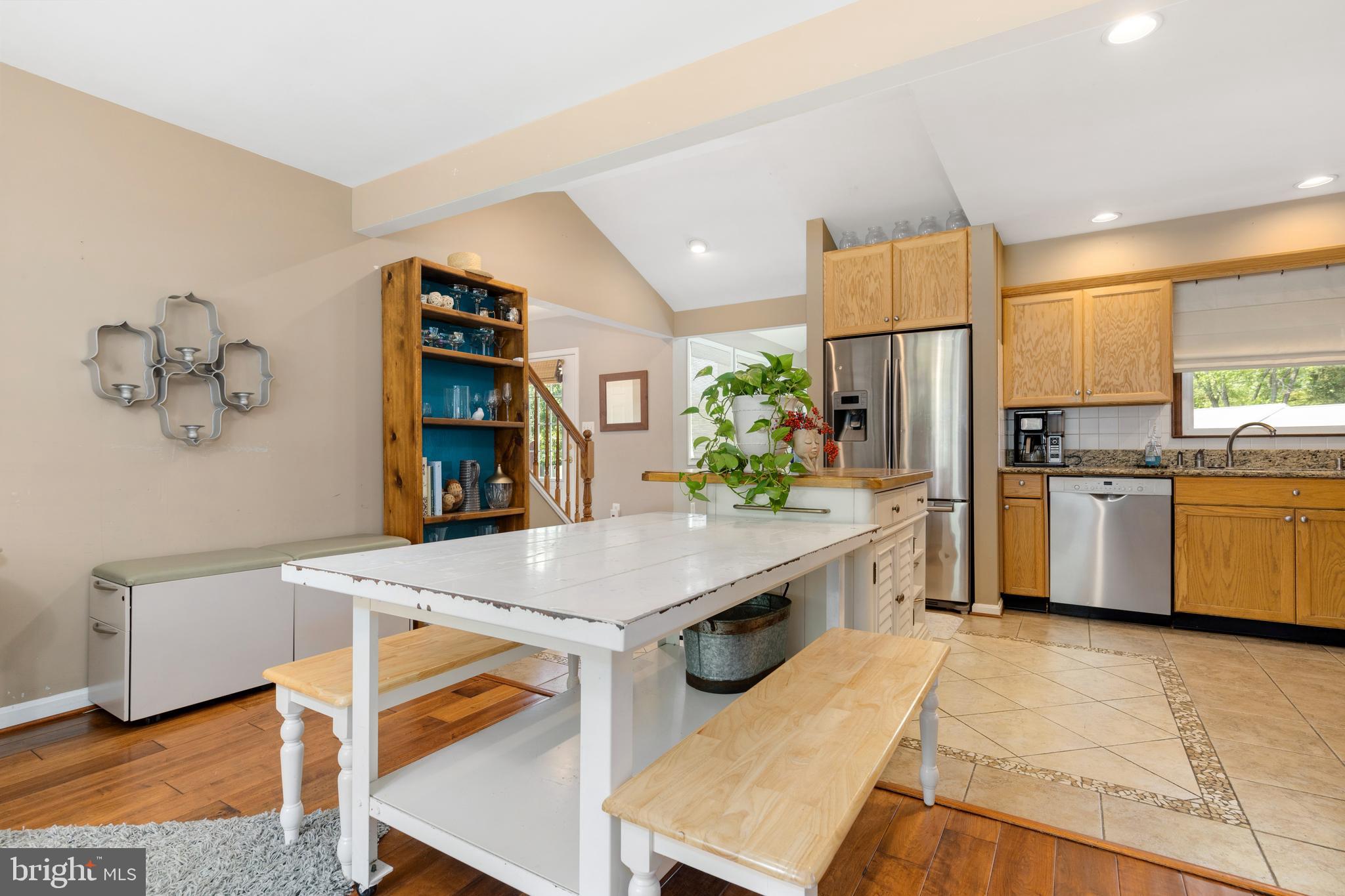 133 Valley View Avenue Edgewater, MD 21037 - Photo 12 of 41 a kitchen with white cabinets and refrigerator