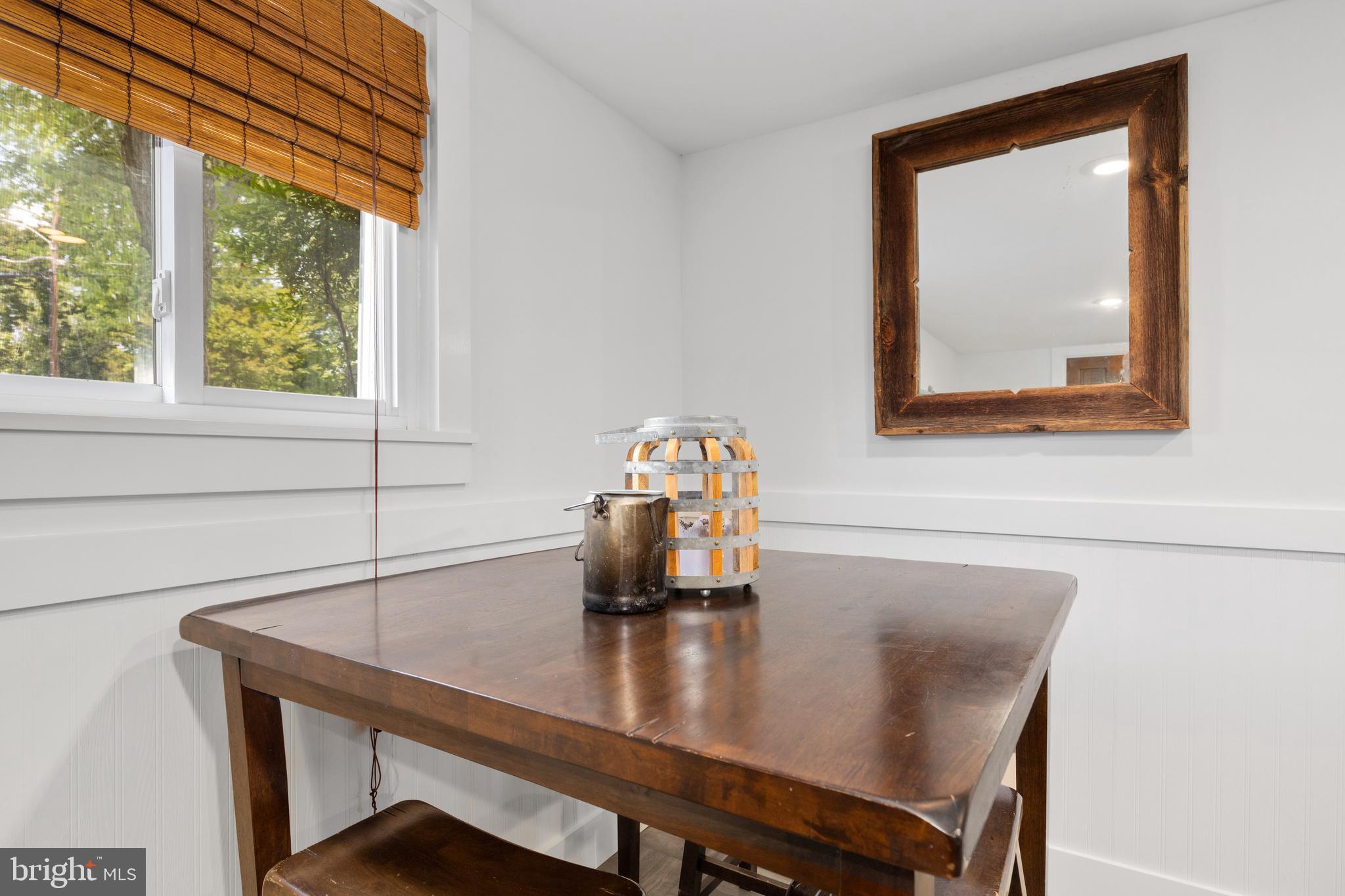 133 Valley View Avenue Edgewater, MD 21037 - Photo 16 of 41 a room with a table and a window