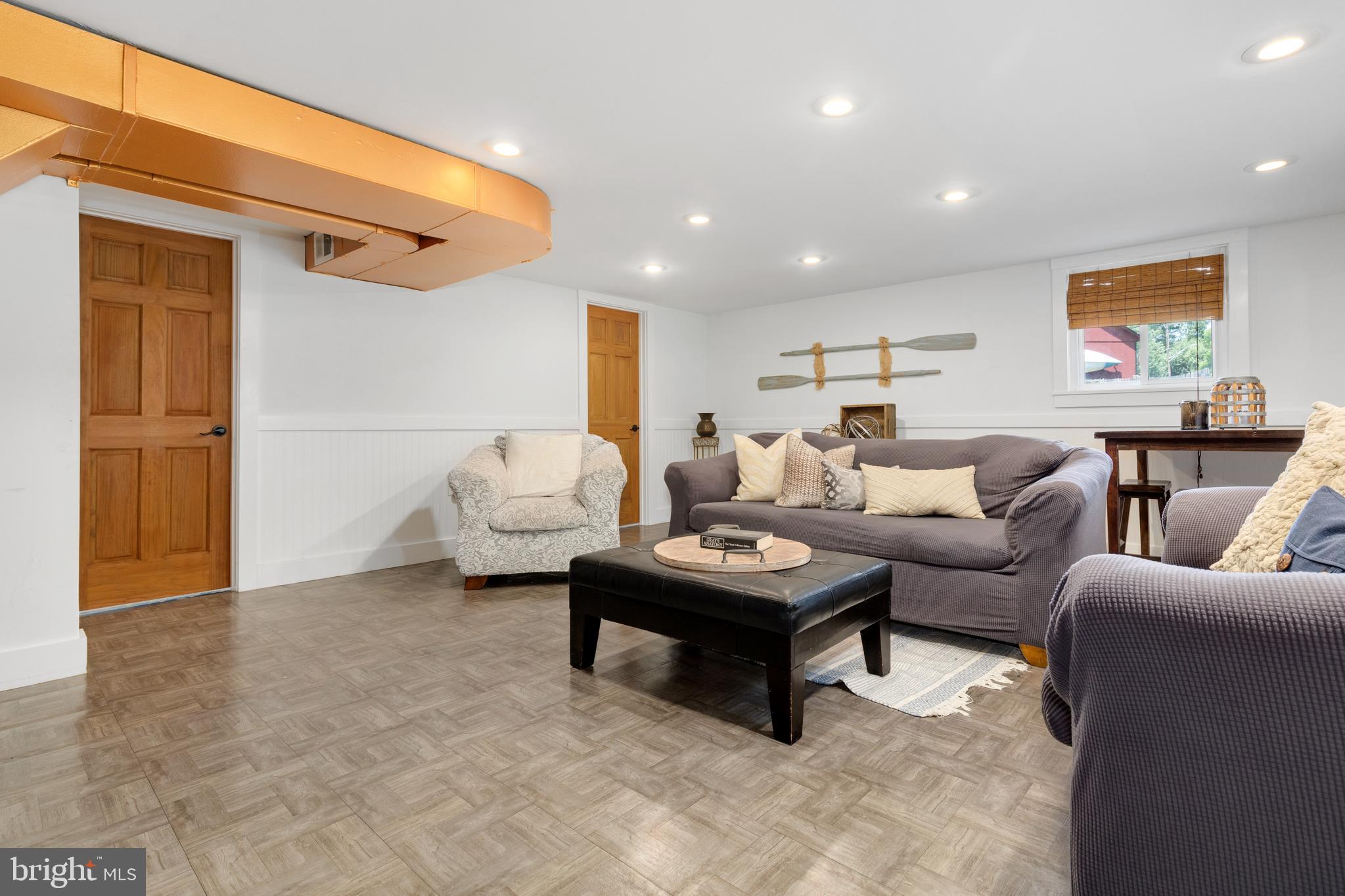 133 Valley View Avenue Edgewater, MD 21037 - Photo 18 of 41 a living room with furniture and a window