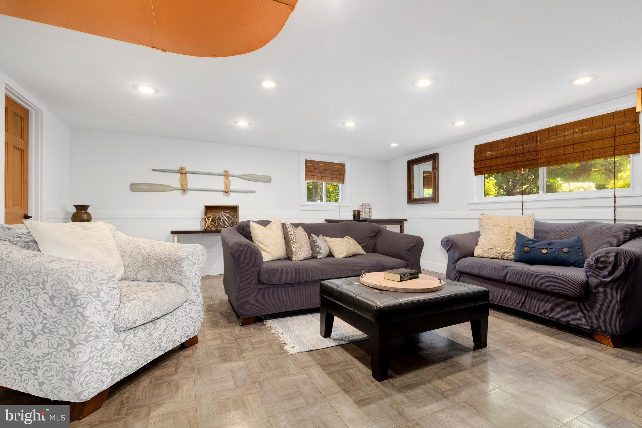 133 Valley View Avenue Edgewater, MD 21037 - Photo 19 of 41 a living room with furniture and a large window