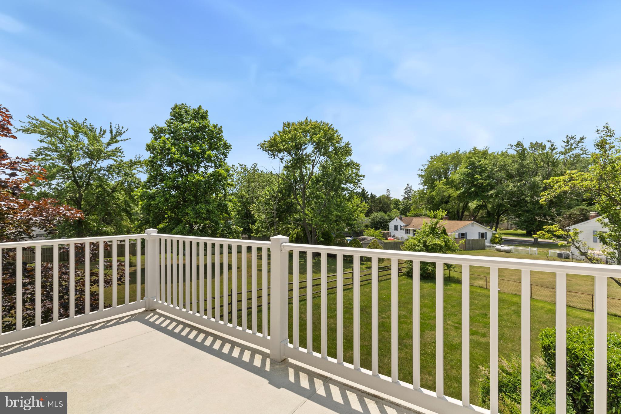 133 Valley View Avenue Edgewater, MD 21037 - Photo 22 of 41 a balcony with trees in front of it