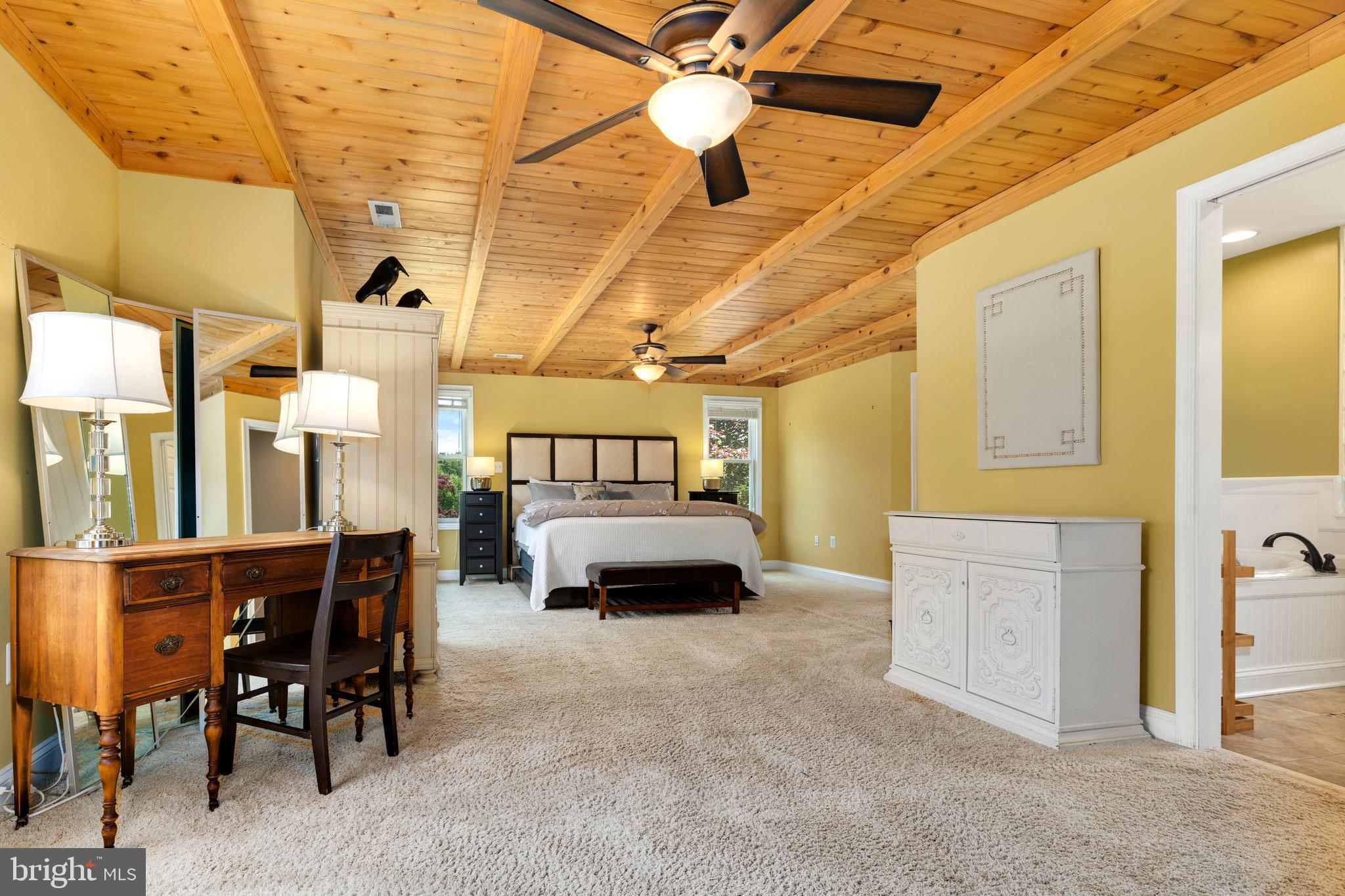 133 Valley View Avenue Edgewater, MD 21037 - Photo 27 of 41 a bedroom with furniture and a chandelier