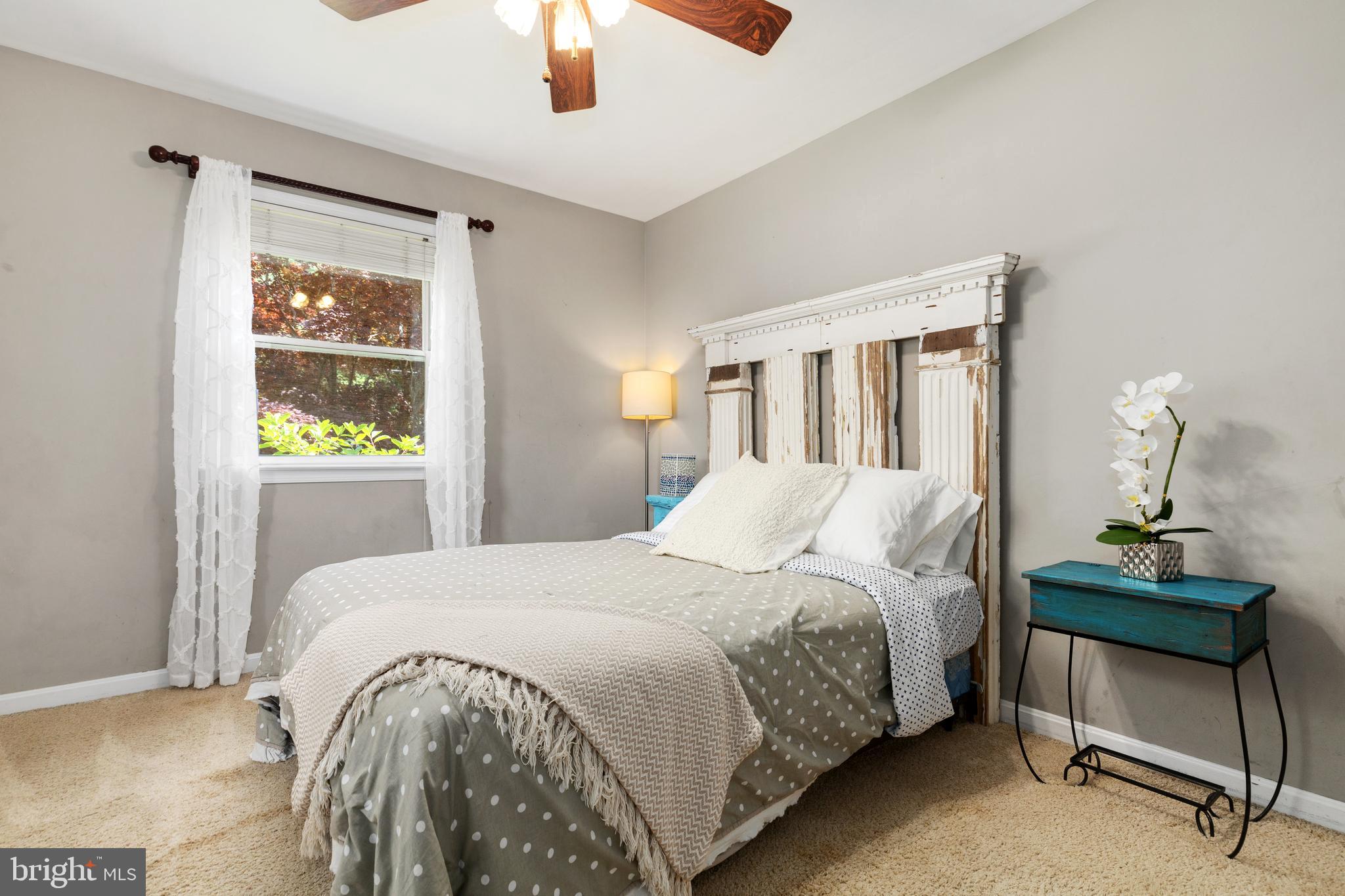 133 Valley View Avenue Edgewater, MD 21037 - Photo 34 of 41 a bedroom with a bed and a desk