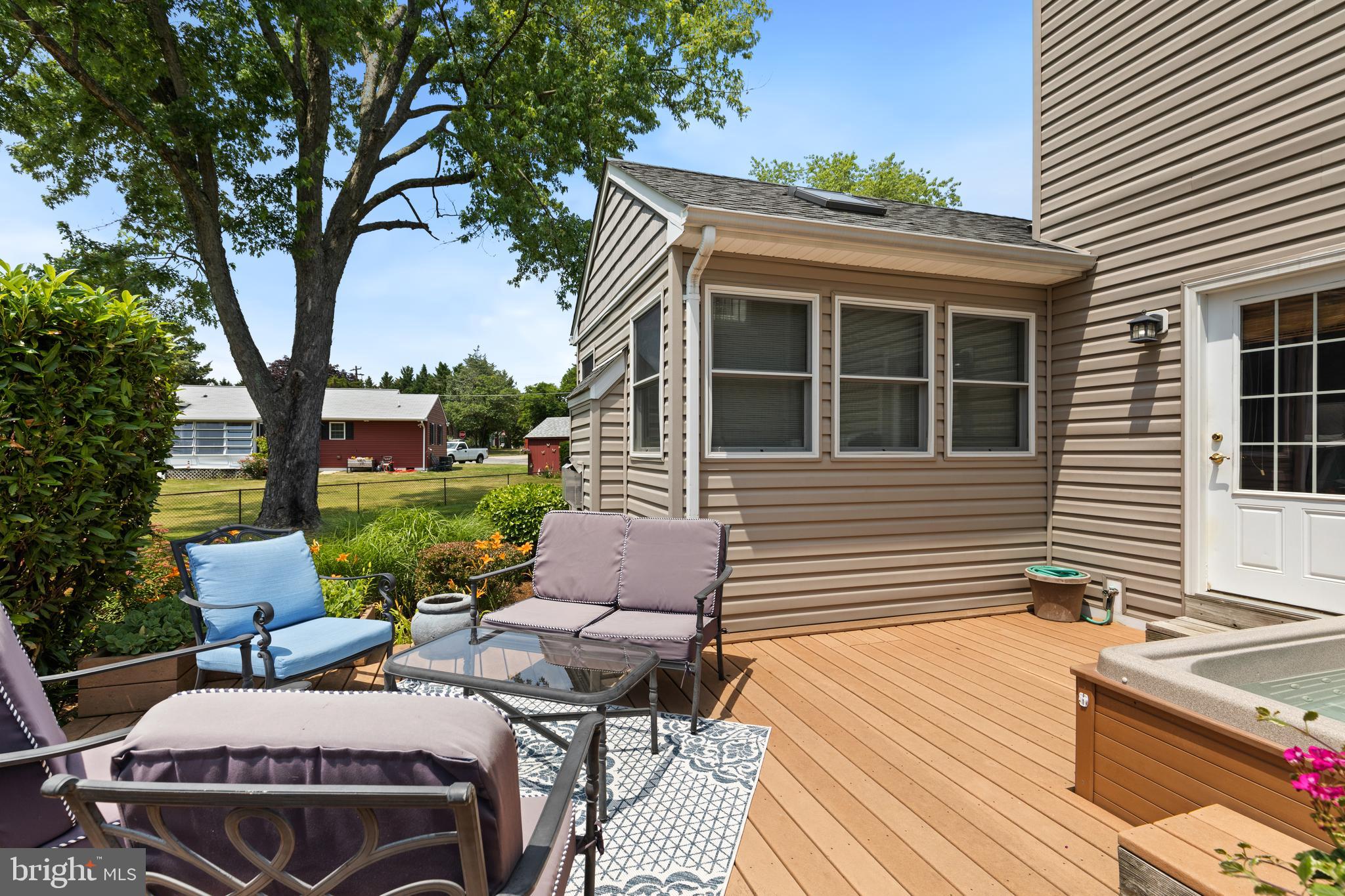133 Valley View Avenue Edgewater, MD 21037 - Photo 8 of 41 a view of a patio with couches chairs and a fire pit