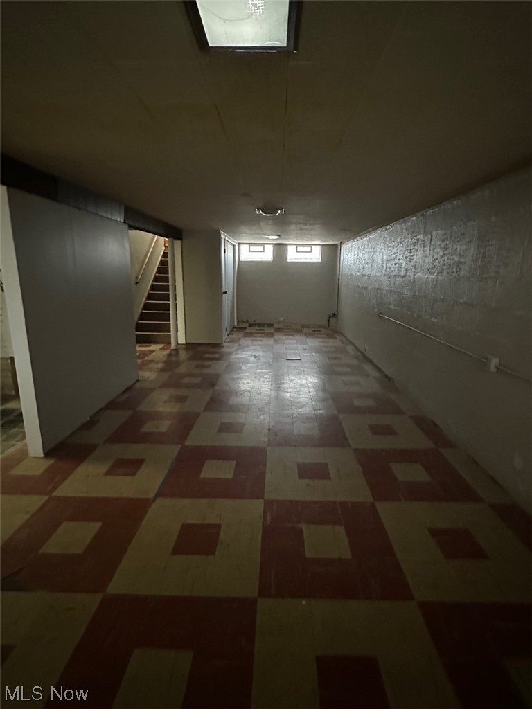 4994 North Barton Road Cleveland, OH 44124 - Photo 17 of 28 Basement featuring dark tile floors
