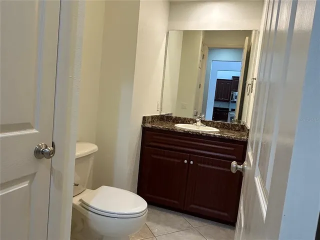 a bathroom with a toilet and a sink