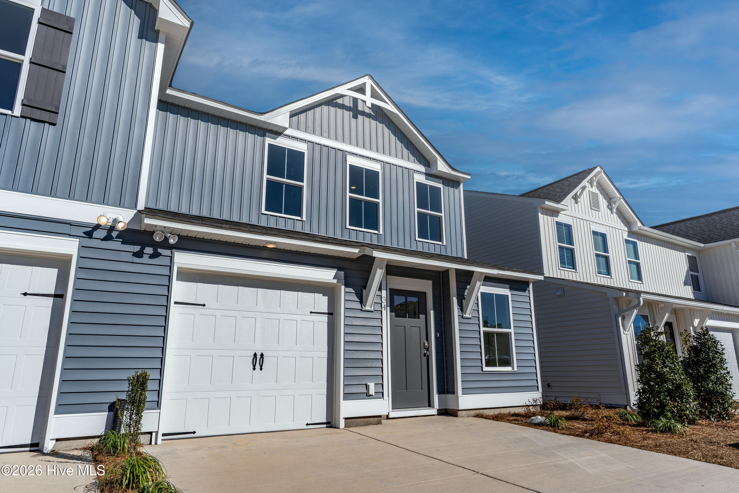 47 West Pioneer Way, Unit 111 Hampstead, NC 28443 - Photo 5 of 31 DQ- 34 W Farley Dr- Sugarhill- Exterior