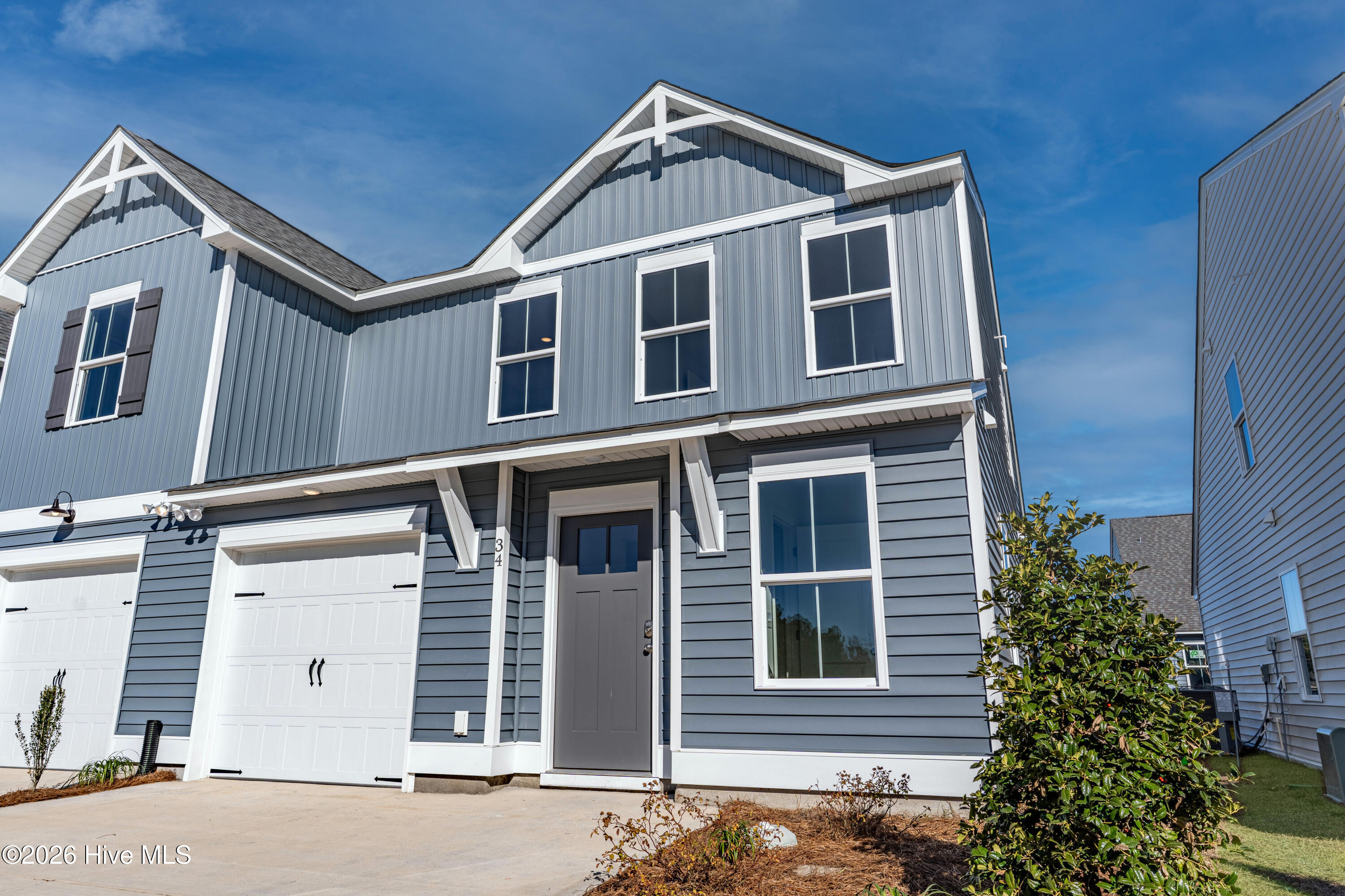 47 West Pioneer Way, Unit 111 Hampstead, NC 28443 - Photo 6 of 31 DQ- 34 W Farley Dr- Sugarhill- Exterior