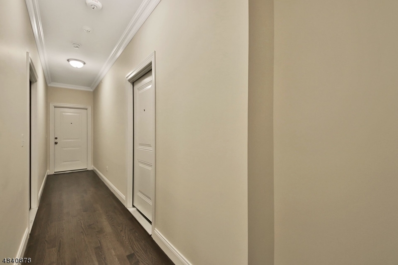 115 Watchung Avenue, Unit 1 Montclair, NJ 07043 - Photo 4 of 15 a view of hallway with stairs