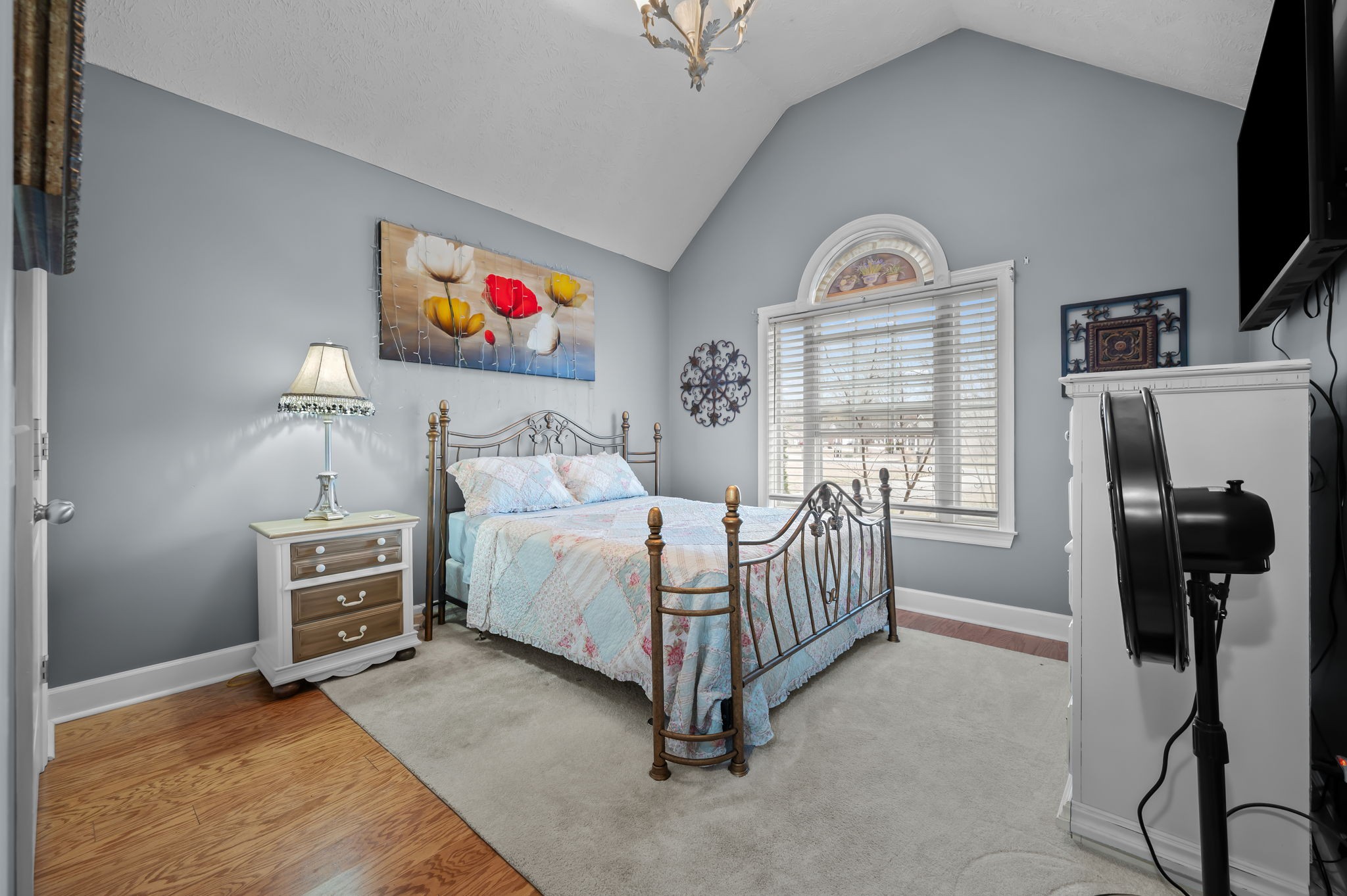 201 Oak Hollow Road Manchester, TN 37355 - Photo 11 of 43 a bedroom with furniture and a flat screen tv