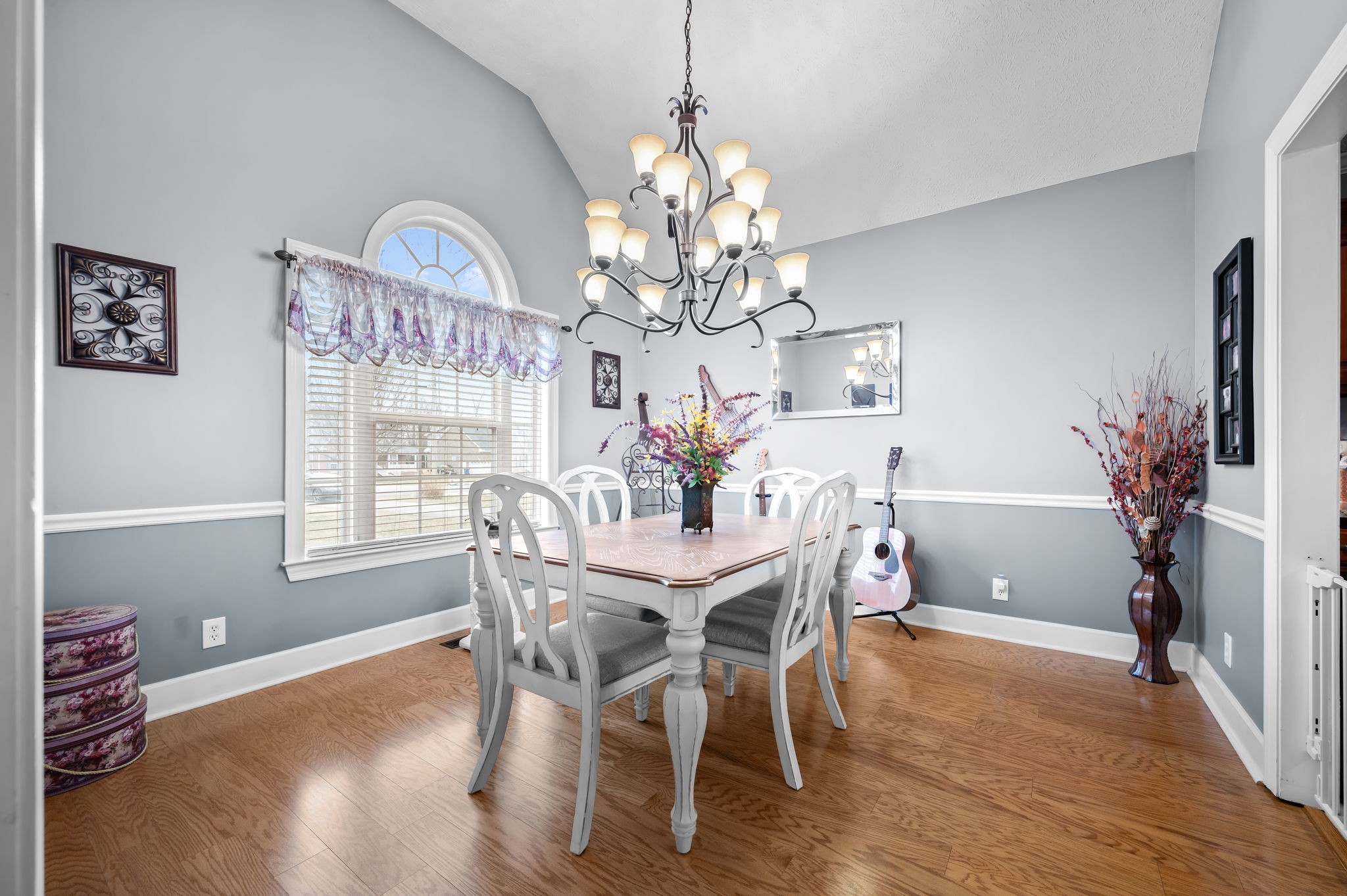 201 Oak Hollow Road Manchester, TN 37355 - Photo 13 of 43 a view of a dining room with furniture a chandelier and wooden floor