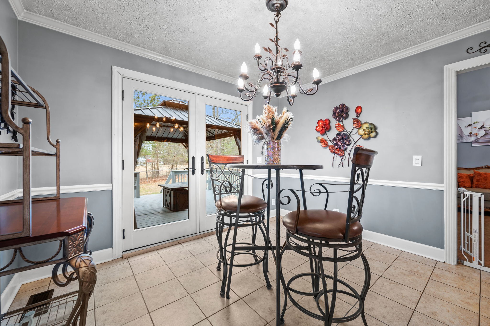 201 Oak Hollow Road Manchester, TN 37355 - Photo 18 of 43 a view of a dining room with furniture and chandelier