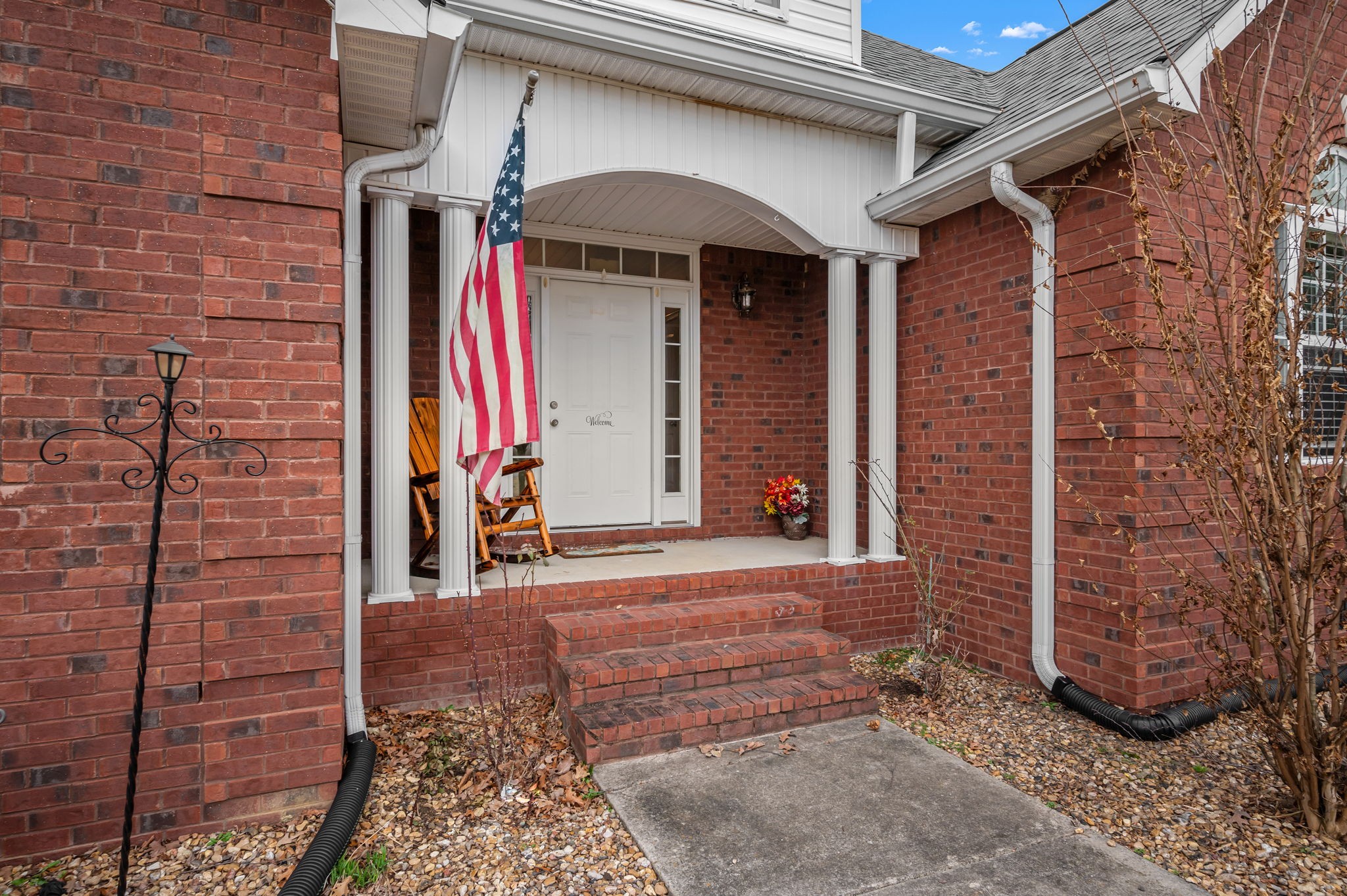 201 Oak Hollow Road Manchester, TN 37355 - Photo 2 of 43 a view of a brick house with many windows