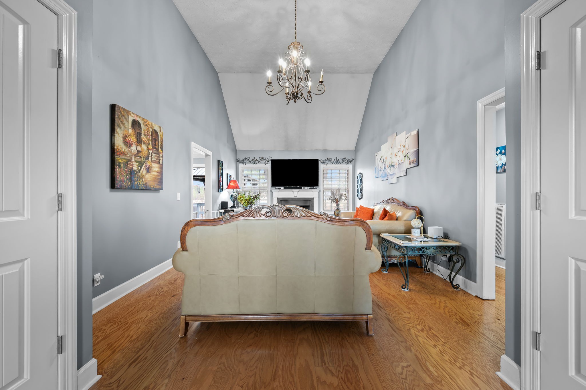 201 Oak Hollow Road Manchester, TN 37355 - Photo 3 of 43 a living room with furniture and a chandelier