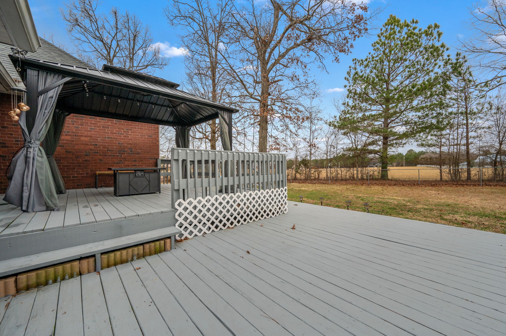201 Oak Hollow Road Manchester, TN 37355 - Photo 31 of 43 a view of backyard with deck and wooden floor