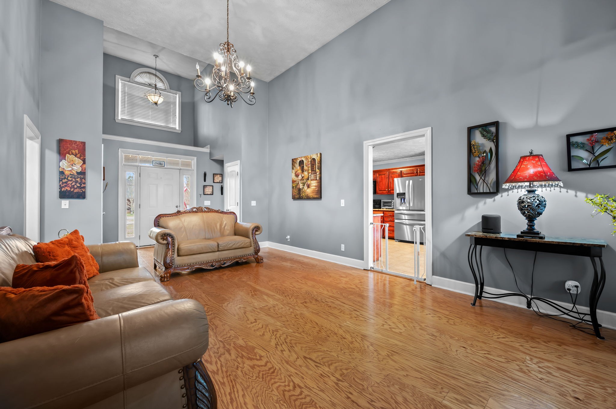 201 Oak Hollow Road Manchester, TN 37355 - Photo 6 of 43 a bedroom with furniture and a chandelier