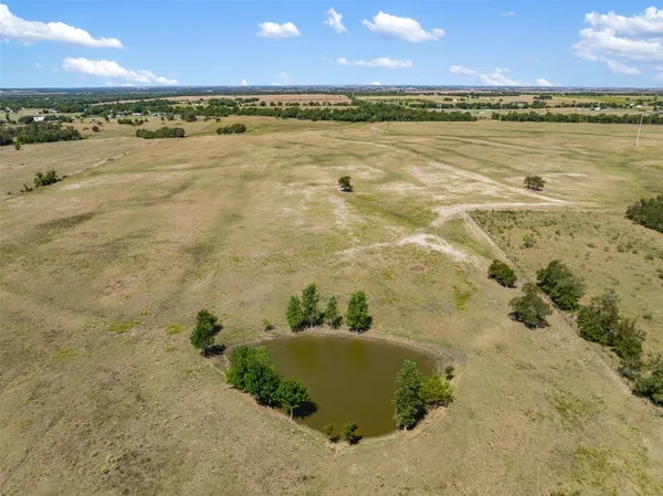 an ocean view with beach