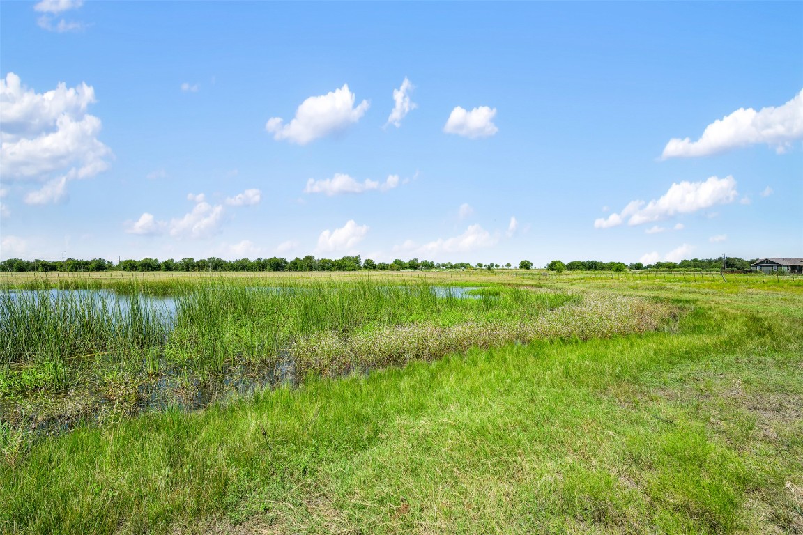 -littig Rd Littig Road Elgin, TX 78621 - Photo 37 of 37 a view of a lake with houses in the back