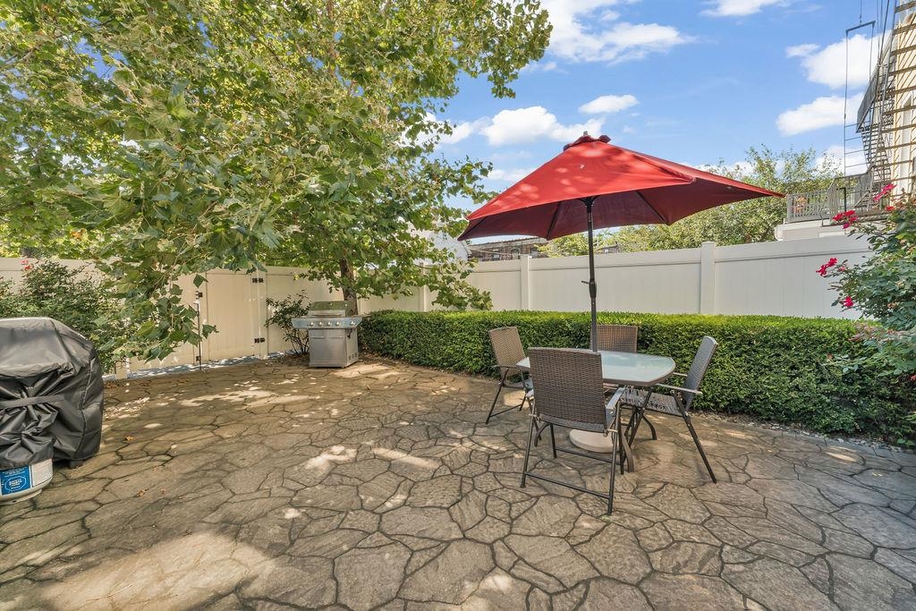 129 Prospect Street, Unit 3 Jersey City, NJ 07307 - Photo 31 of 34 a view of a backyard with sitting area and furniture