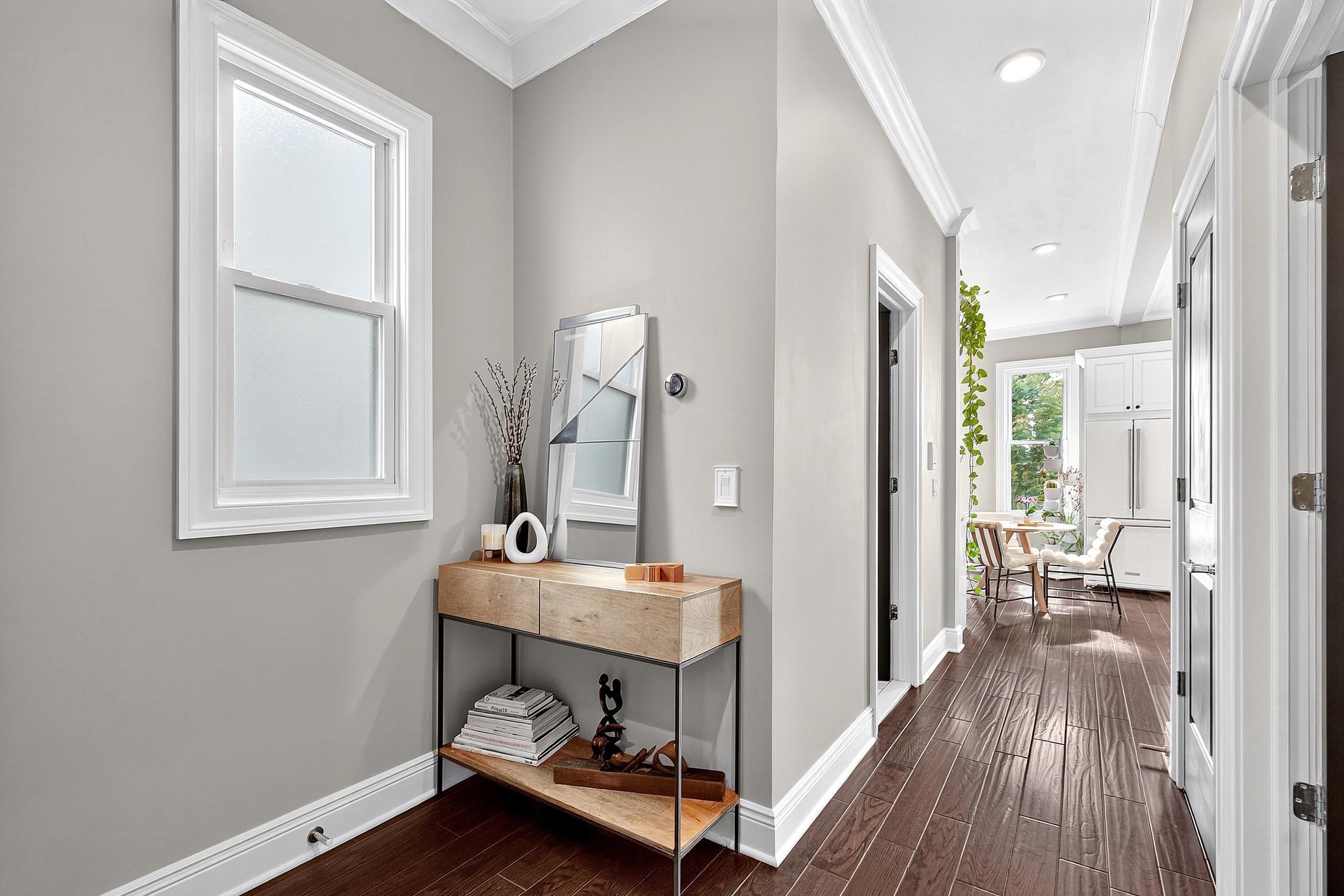 129 Prospect Street, Unit 3 Jersey City, NJ 07307 - Photo 8 of 34 a room with table and chair