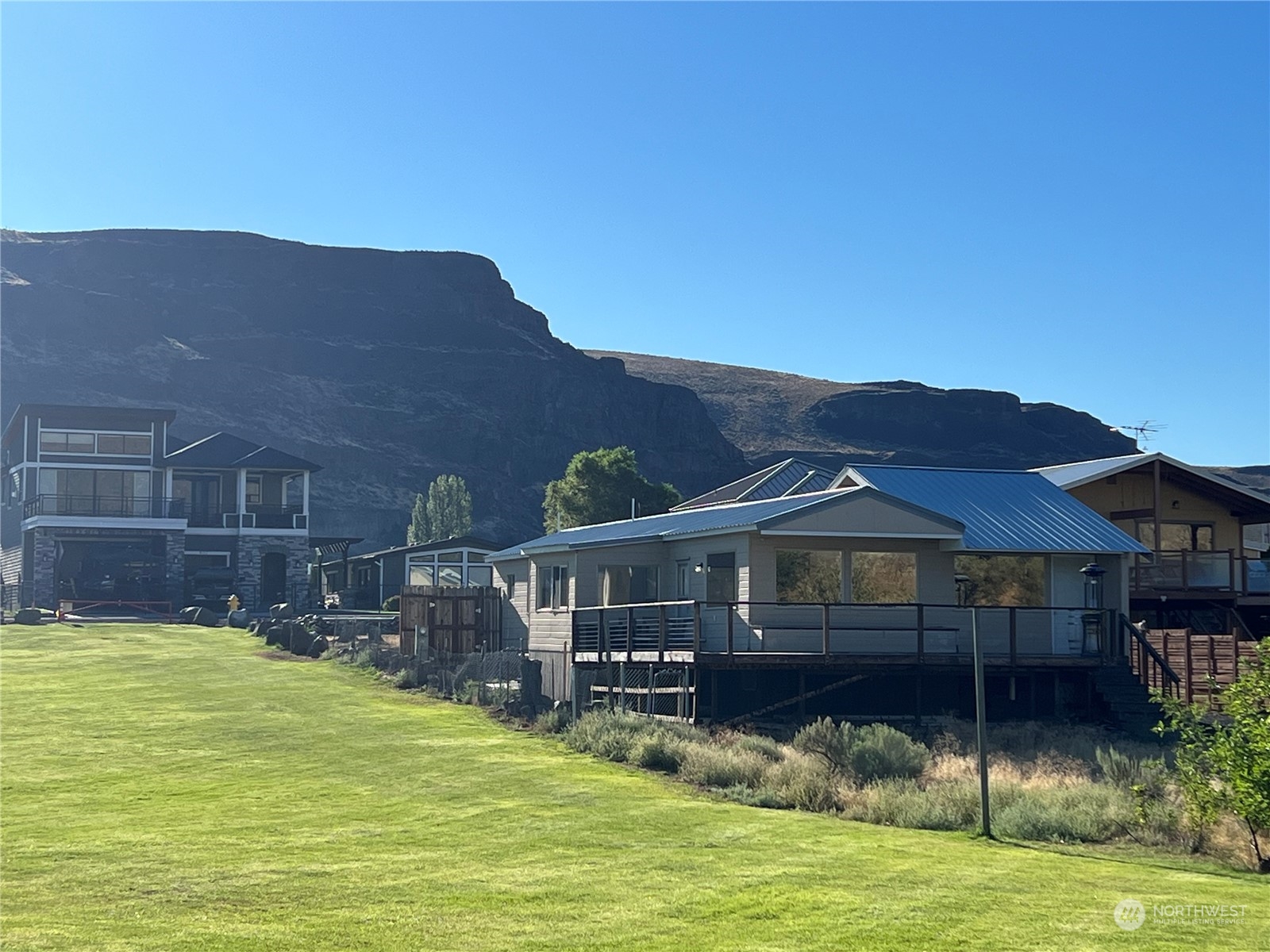 910 River Drive Quincy, WA 98848 - Photo 12 of 15 a front view of a house with a garden