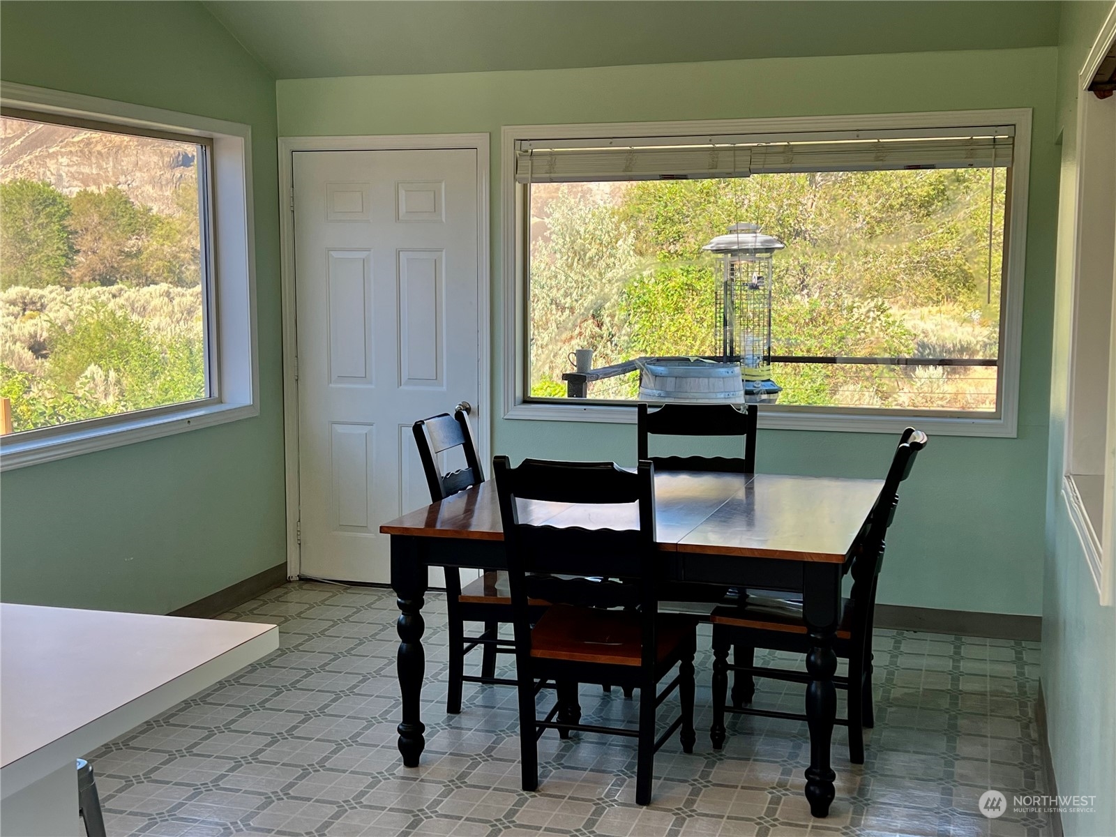 910 River Drive Quincy, WA 98848 - Photo 5 of 15 a view of a dining room with furniture window and outside view